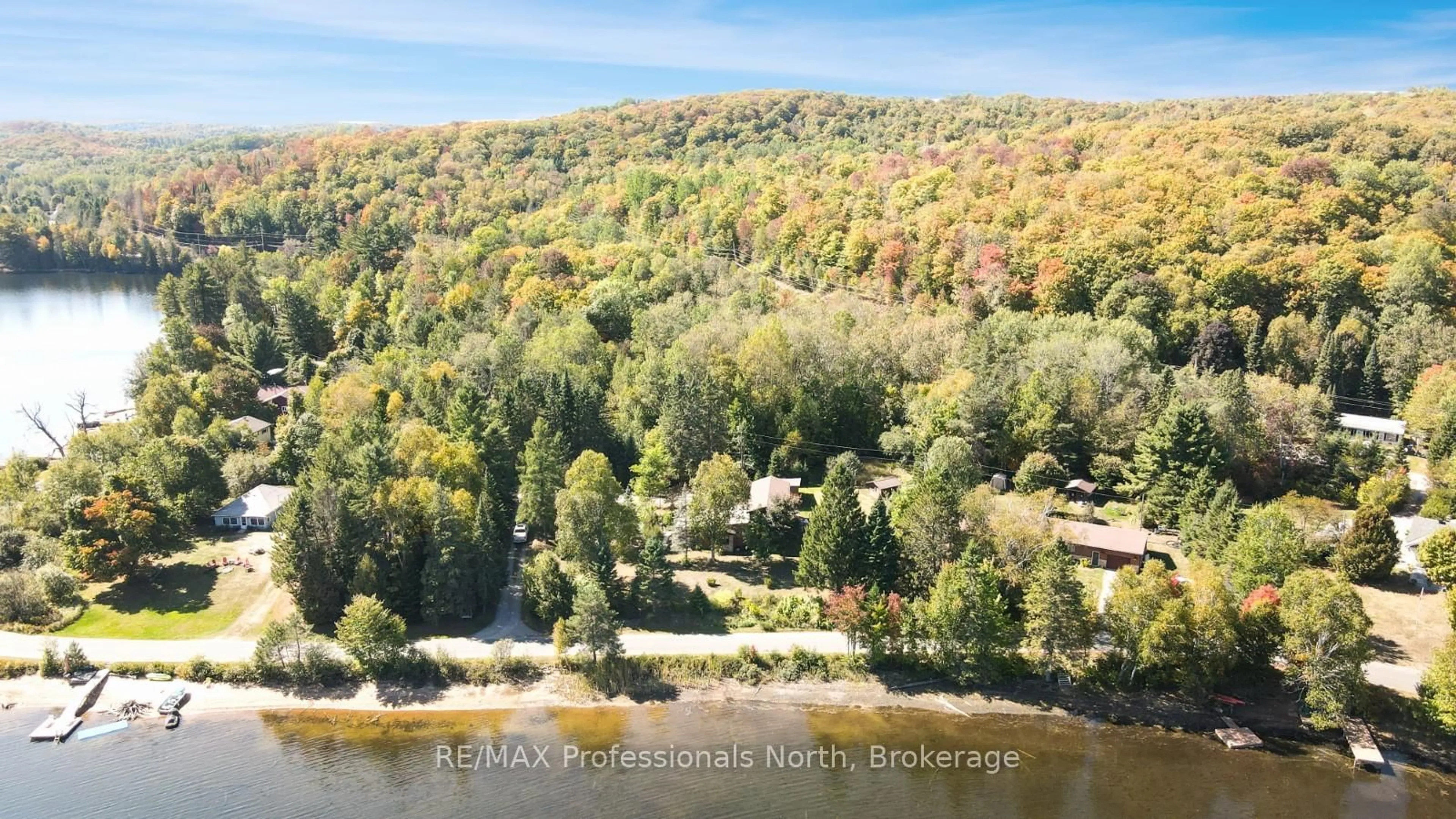 A pic from outside/outdoor area/front of a property/back of a property/a pic from drone, water/lake/river/ocean view for 1093 Dark Lake Rd, Highlands East Ontario K0L 3C0