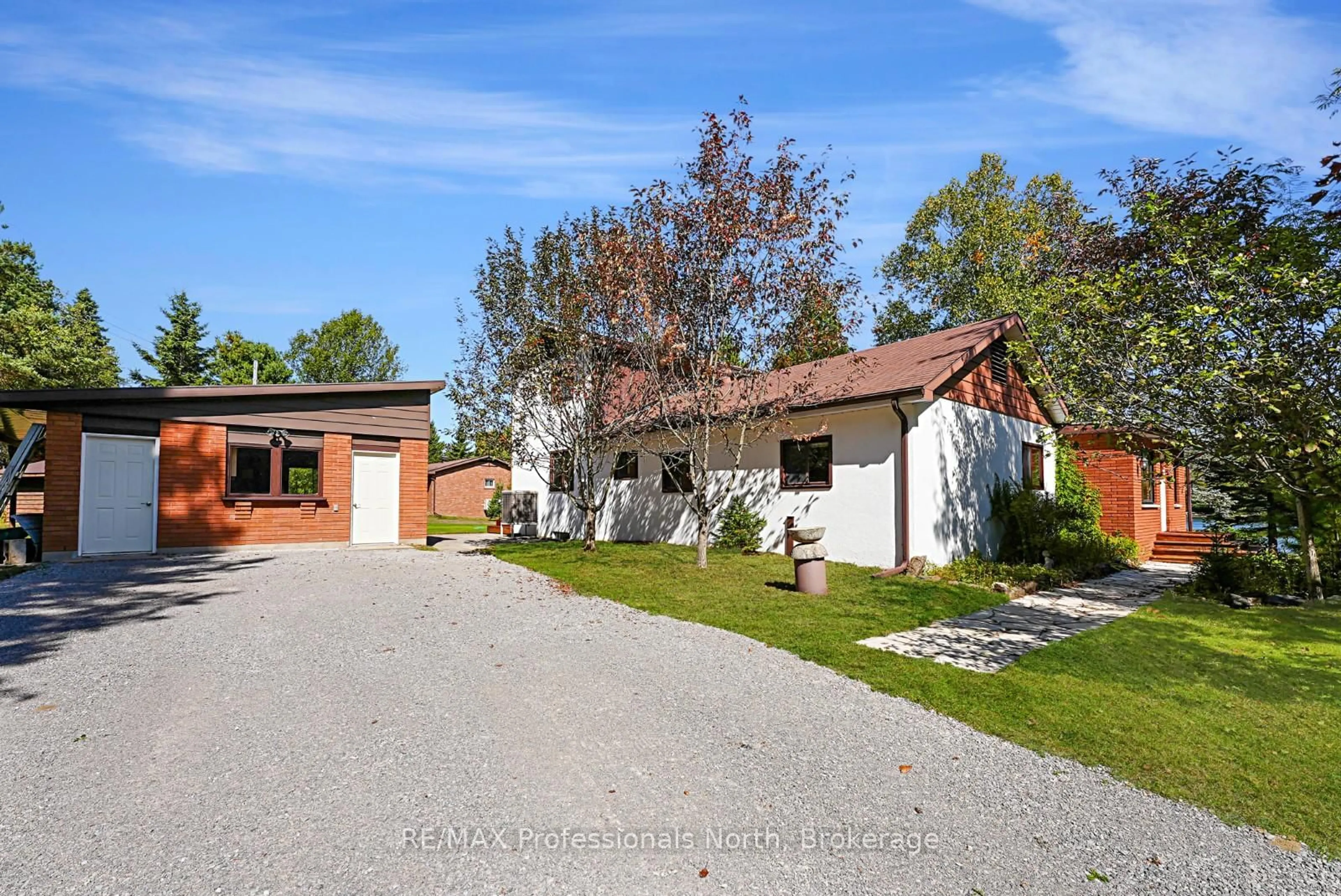 A pic from outside/outdoor area/front of a property/back of a property/a pic from drone, street for 1093 Dark Lake Rd, Highlands East Ontario K0L 3C0