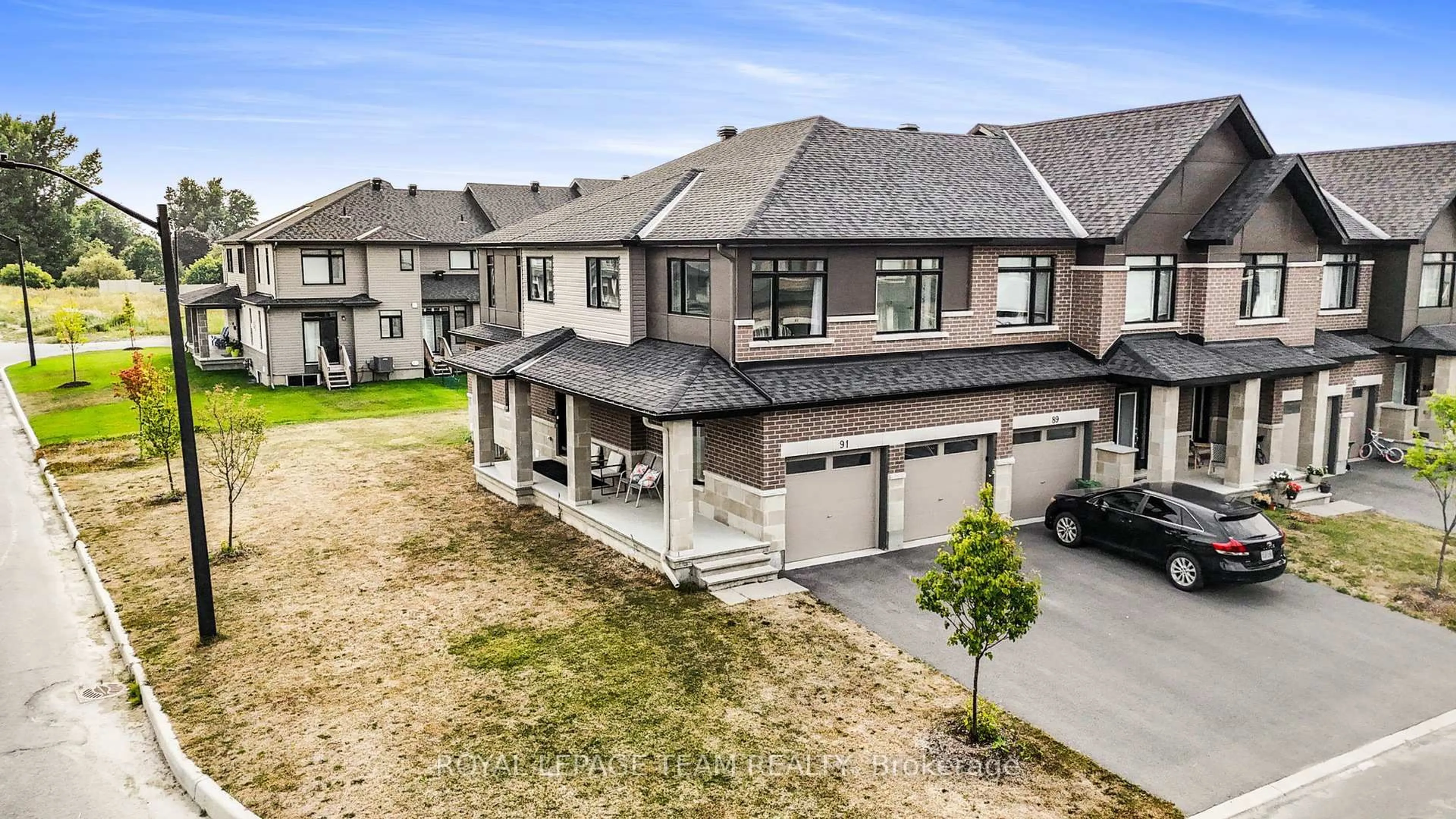 A pic from outside/outdoor area/front of a property/back of a property/a pic from drone, street for 91 Heirloom St, Ottawa Ontario K4M 0L2