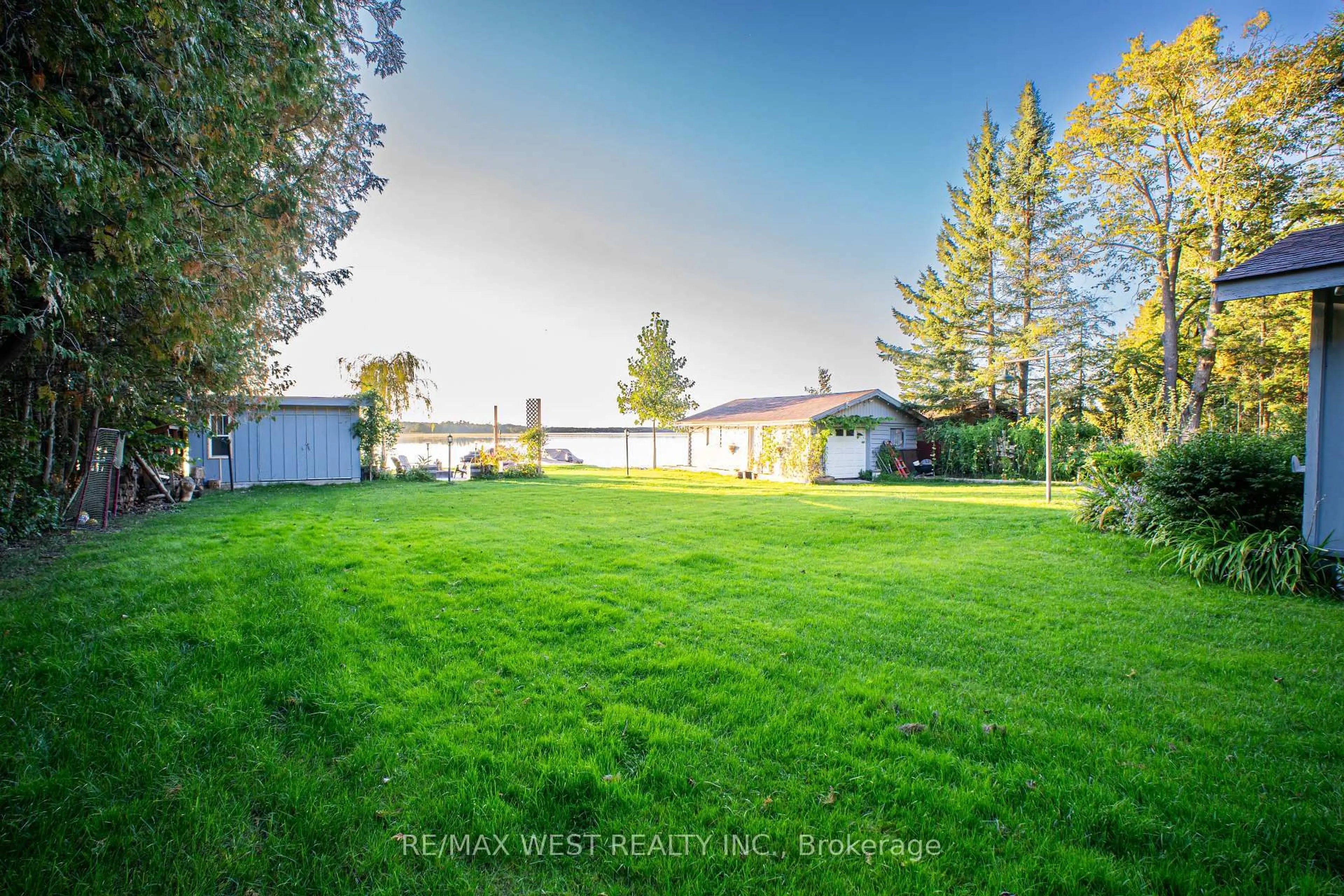 A pic from outside/outdoor area/front of a property/back of a property/a pic from drone, water/lake/river/ocean view for 1392 Island View Dr, Selwyn Ontario K0L 1T0