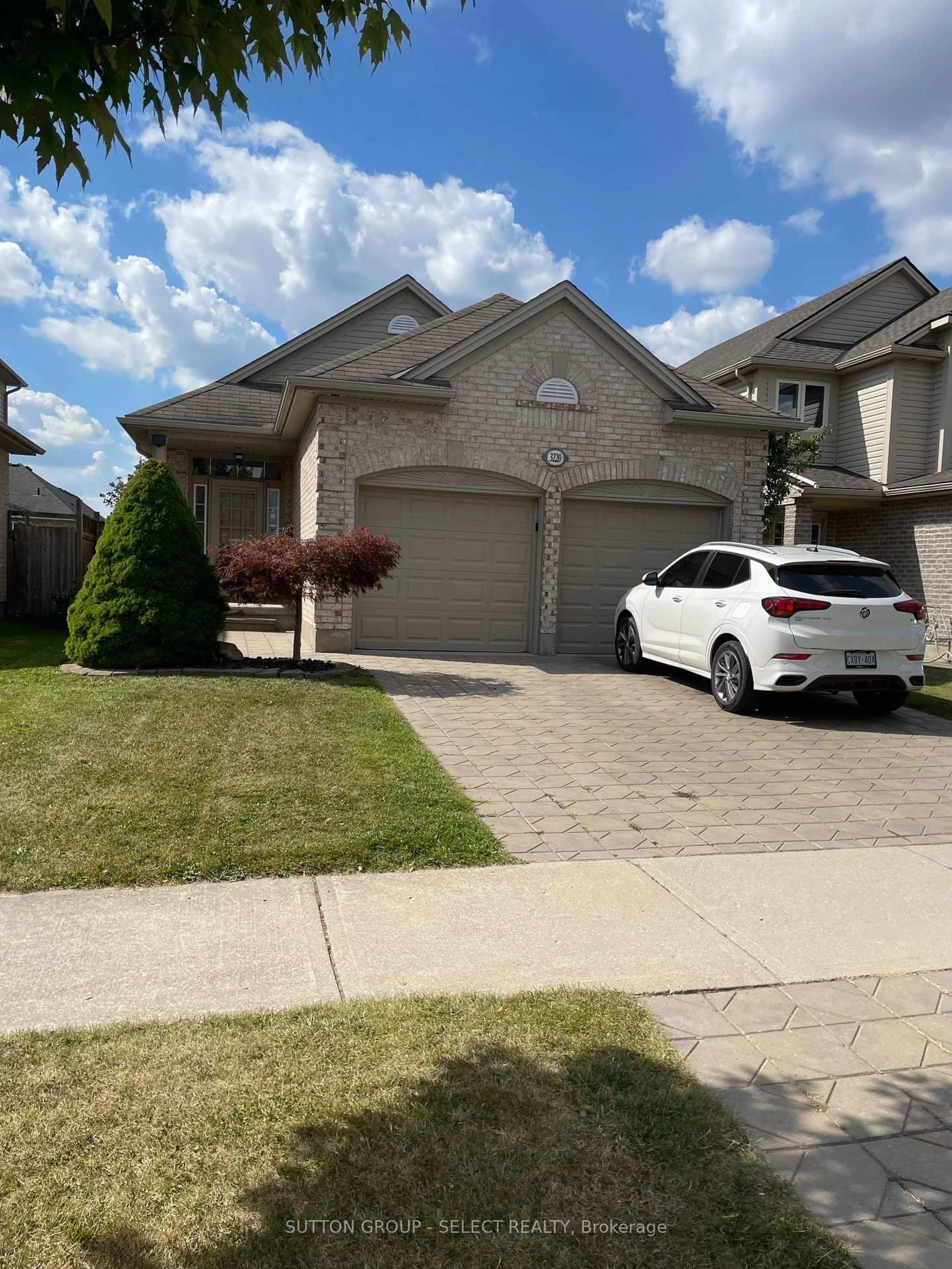 Home with brick exterior material, street for 3220 Meadowgate Blvd, London South Ontario N6M 0B7