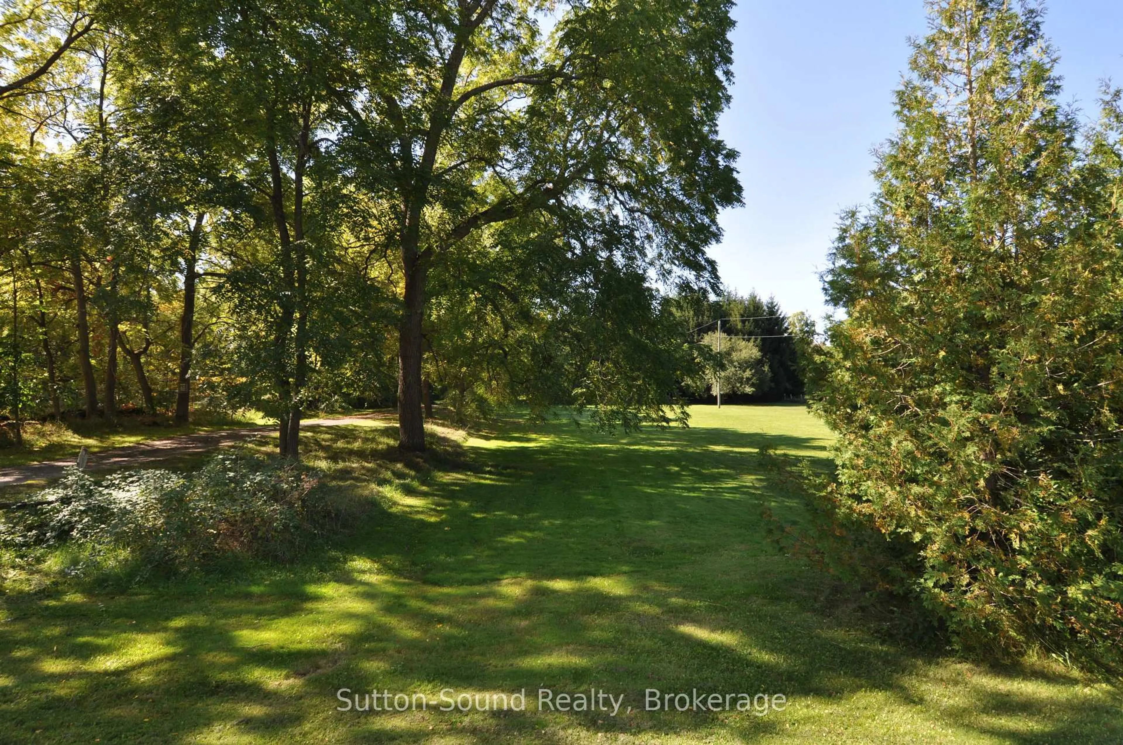 A pic from outside/outdoor area/front of a property/back of a property/a pic from drone, forest/trees view for 750816 Girl Guide Rd, Georgian Bluffs Ontario N4K 5N7