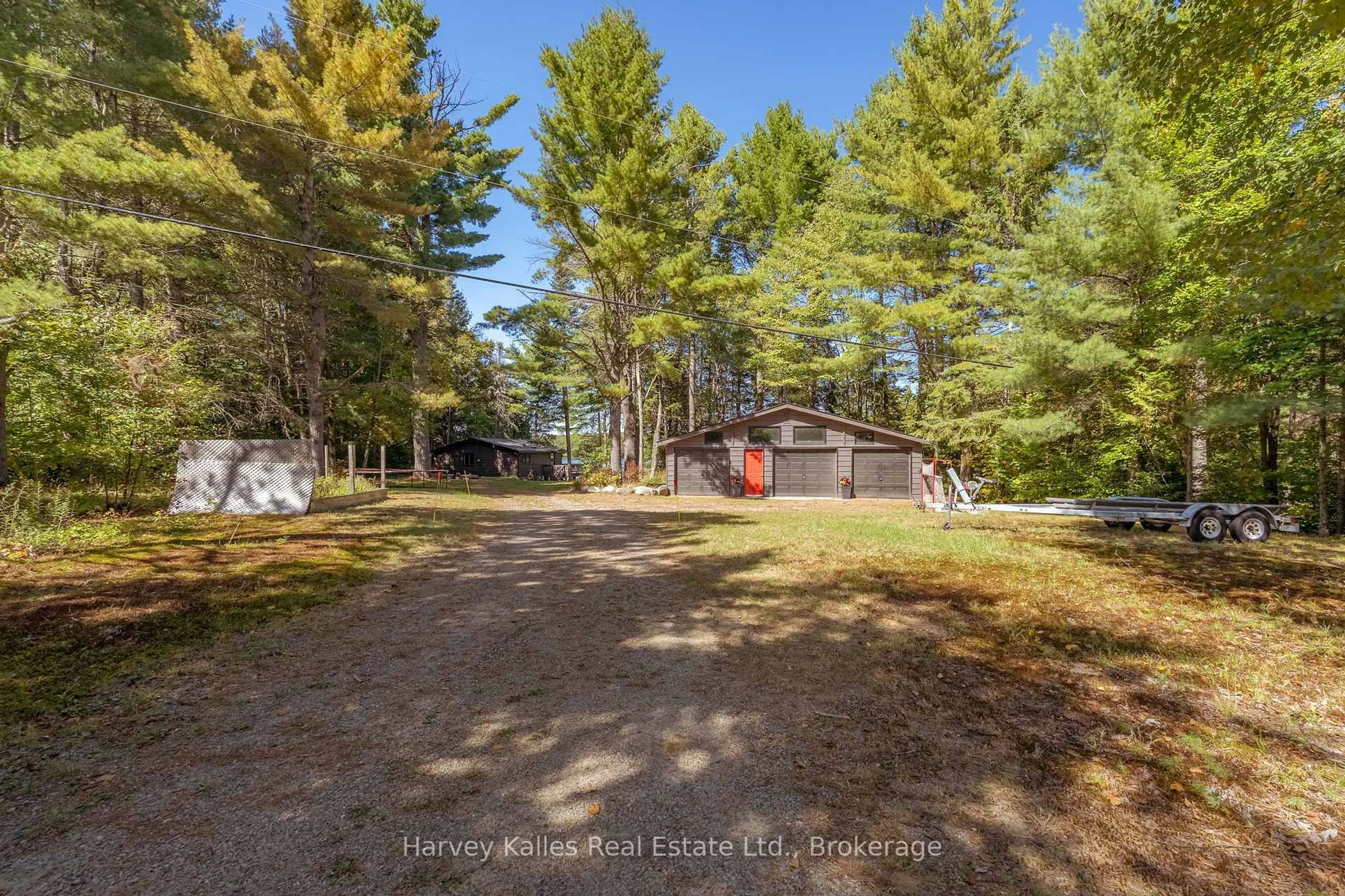 A pic from outside/outdoor area/front of a property/back of a property/a pic from drone, forest/trees view for 1003 Hollow Rd, Algonquin Highlands Ontario P0A 1E0