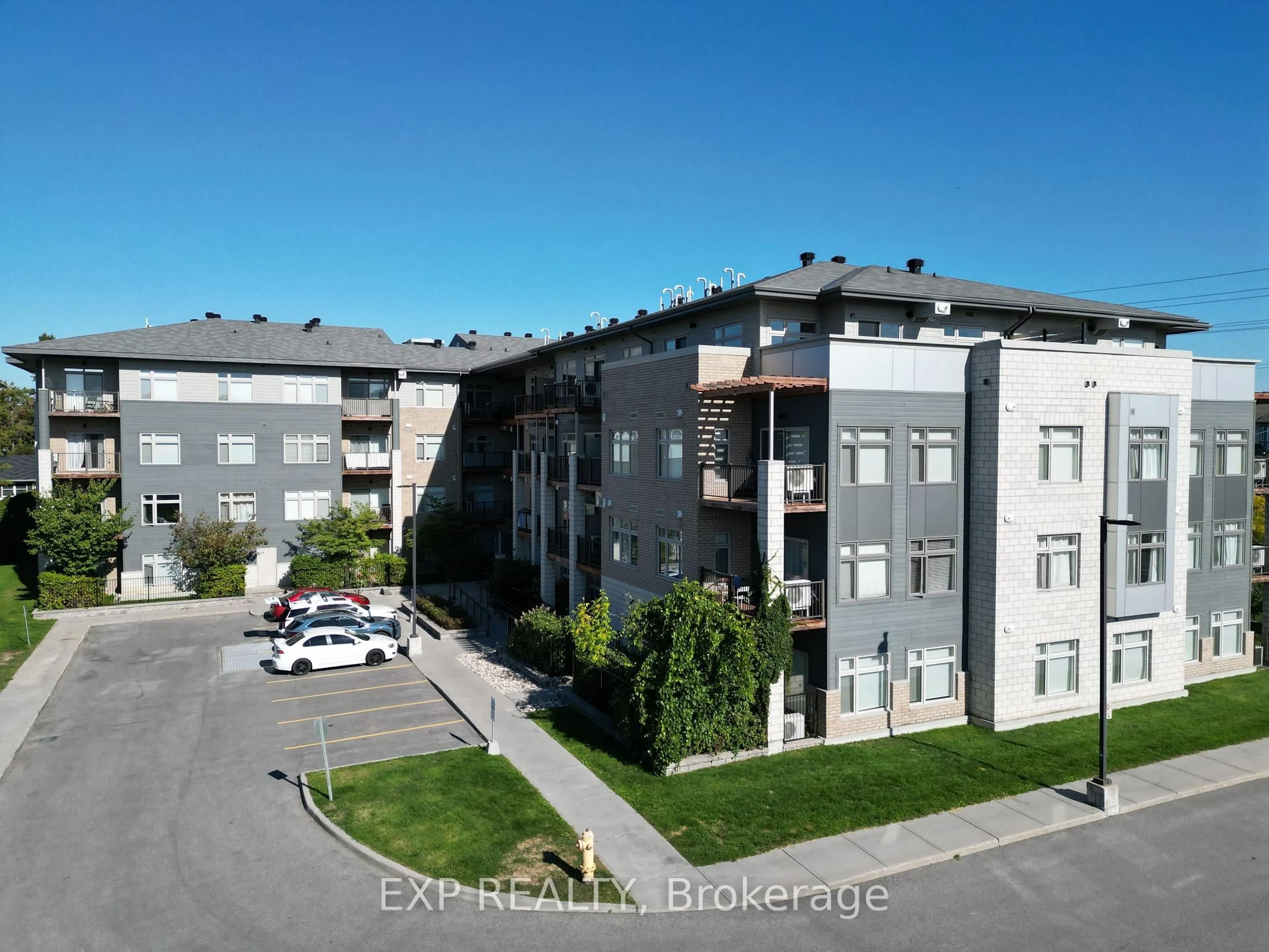 A pic from outside/outdoor area/front of a property/back of a property/a pic from drone, unknown for 2785 Baseline Rd #108, Ottawa Ontario K2H 0B7