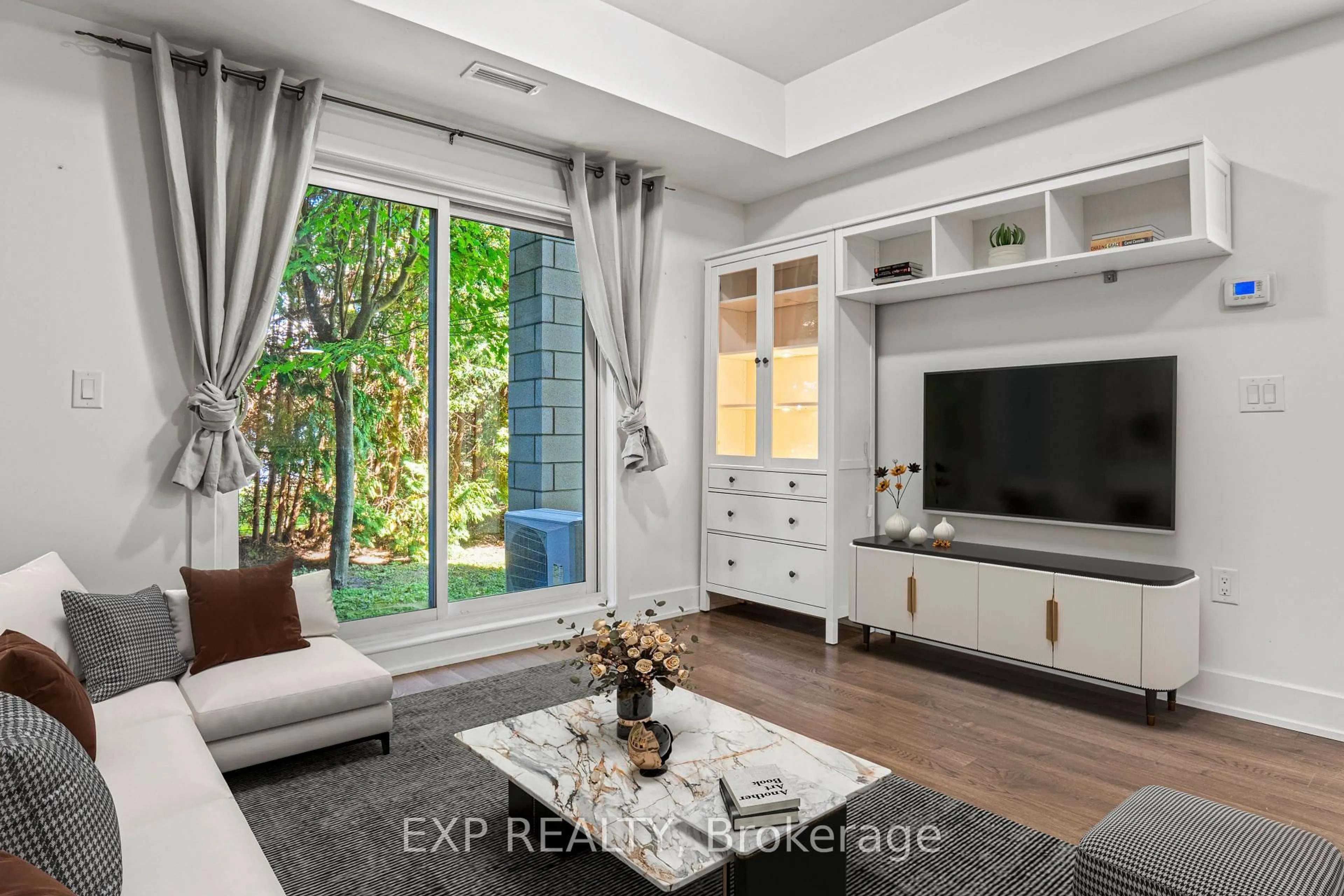 Living room with furniture, unknown for 2785 Baseline Rd #108, Ottawa Ontario K2H 0B7