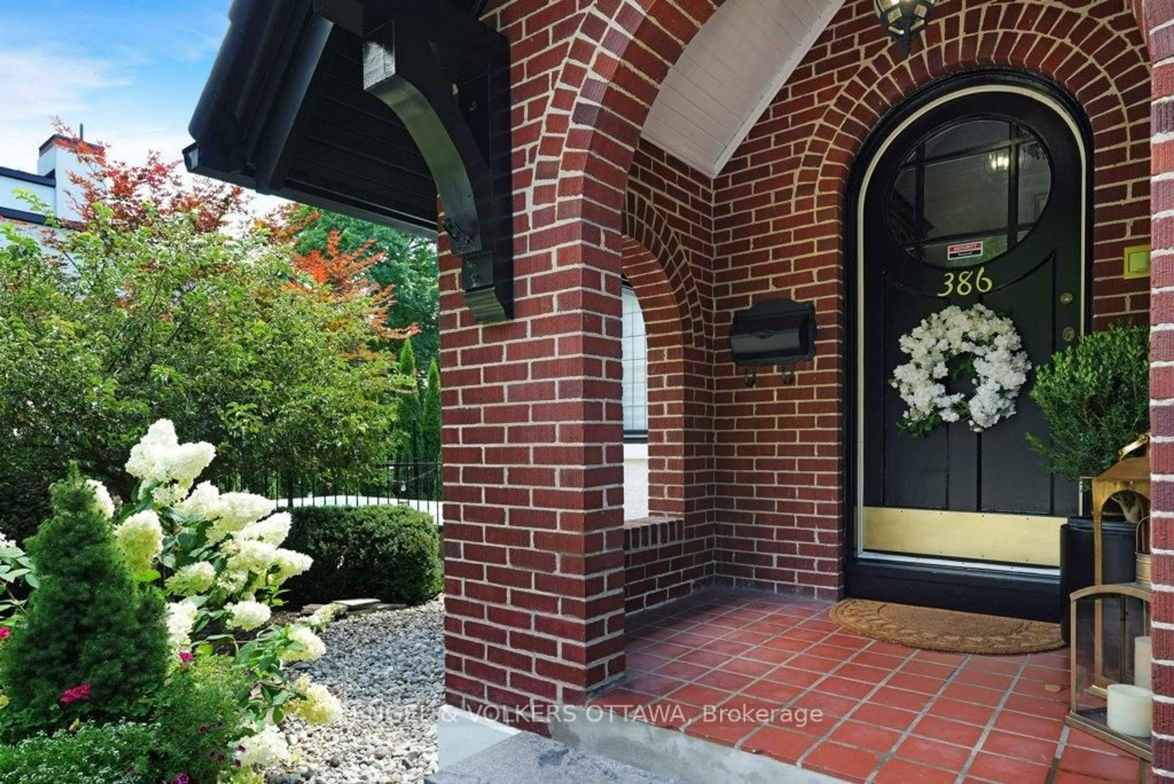 Home with brick exterior material, street for 386 Ashbury Rd, Ottawa Ontario K1M 0R8