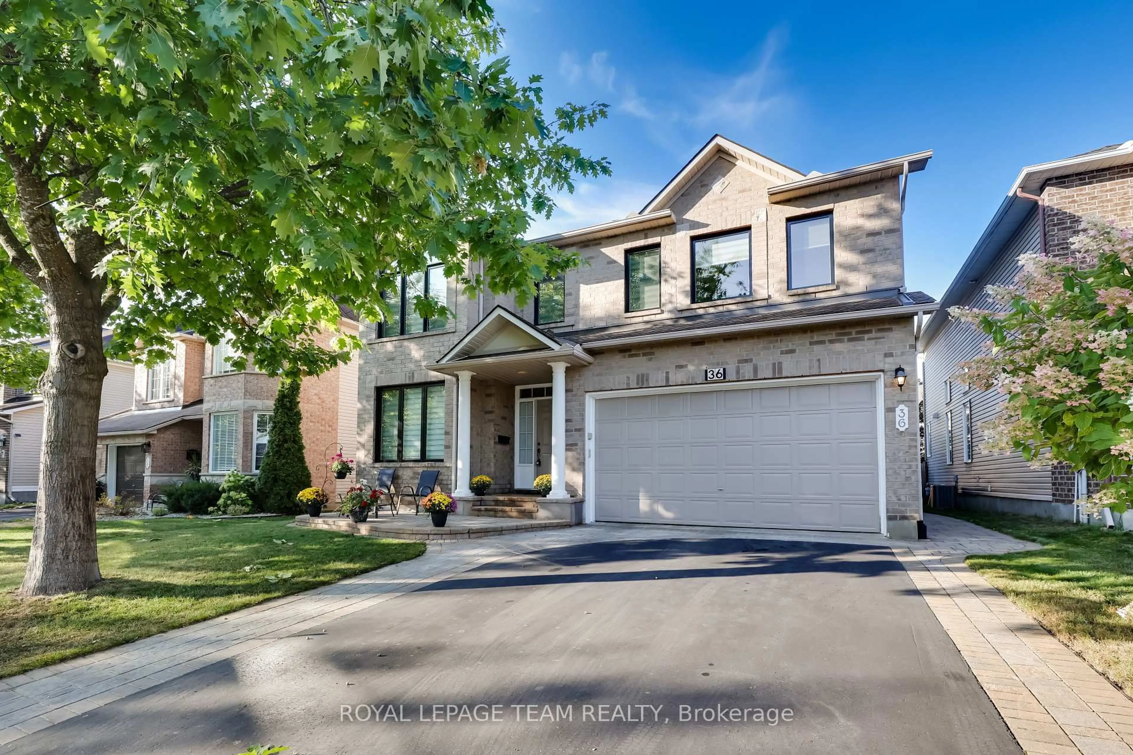 Home with brick exterior material, street for 36 Keighley Circ, Ottawa Ontario K2K 3H8