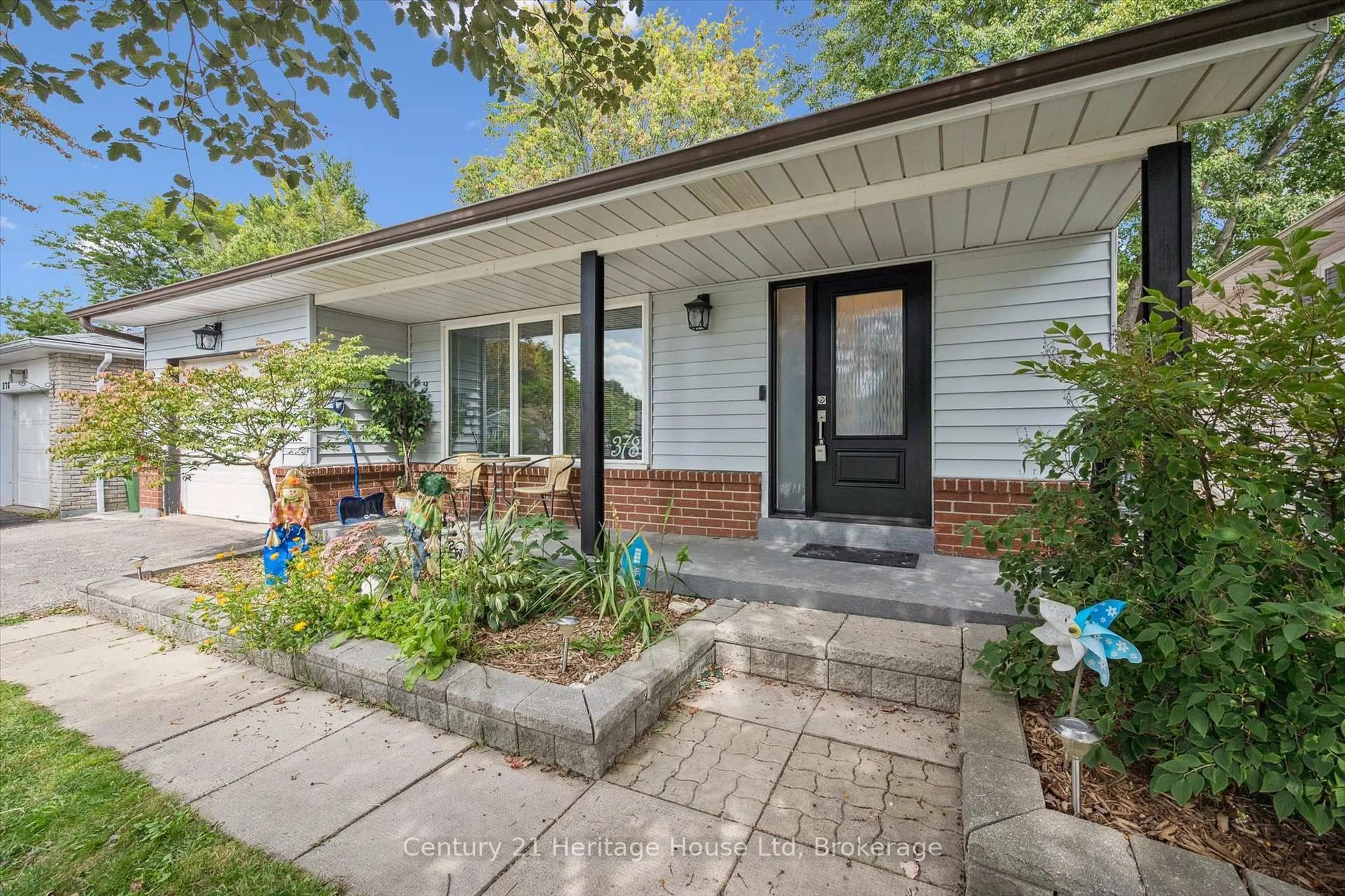 Home with vinyl exterior material, street for 378 West Acres Dr, Guelph Ontario N1H 7A8