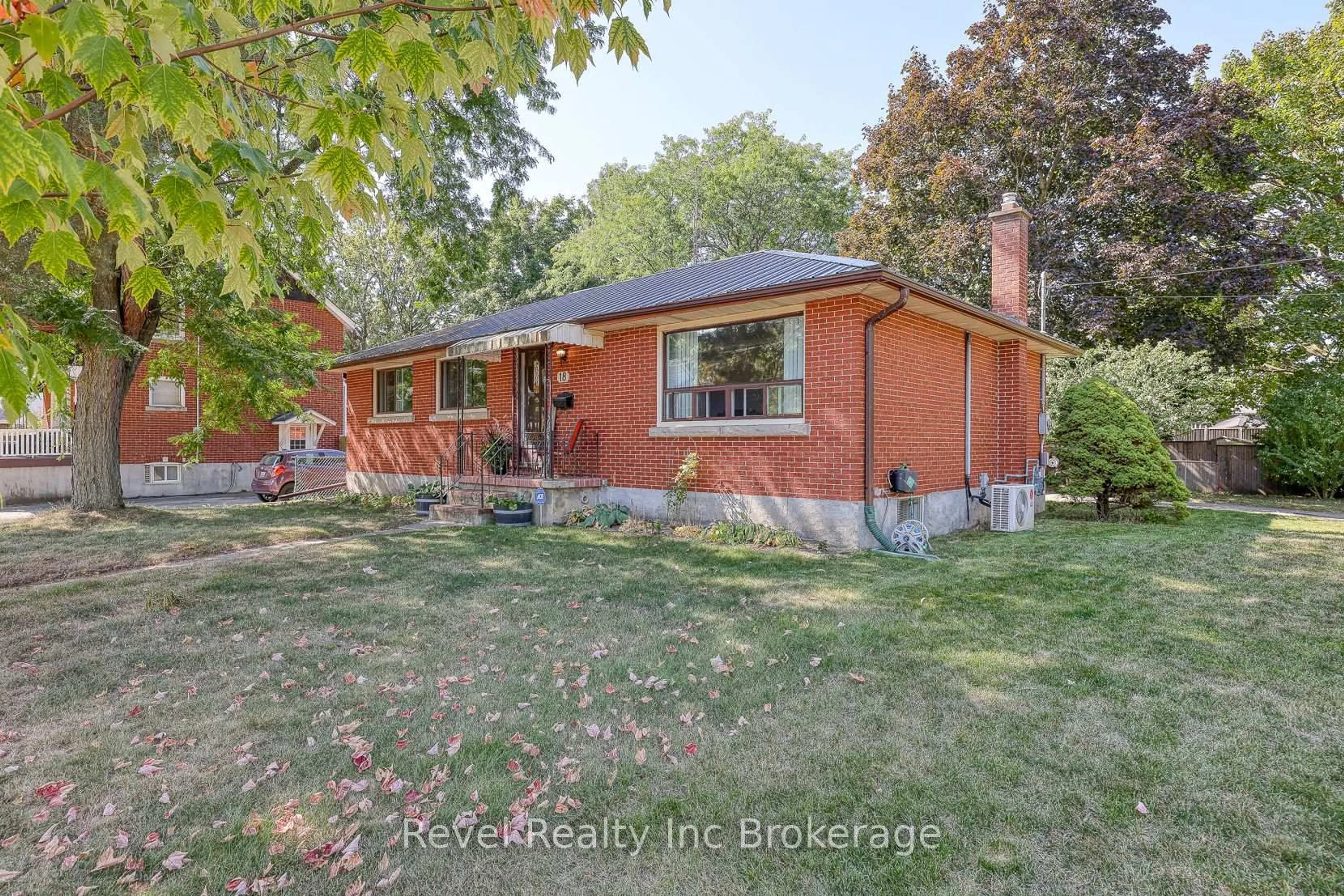 Home with brick exterior material, street for 18 First Ave, Brantford Ontario N3S 6R9