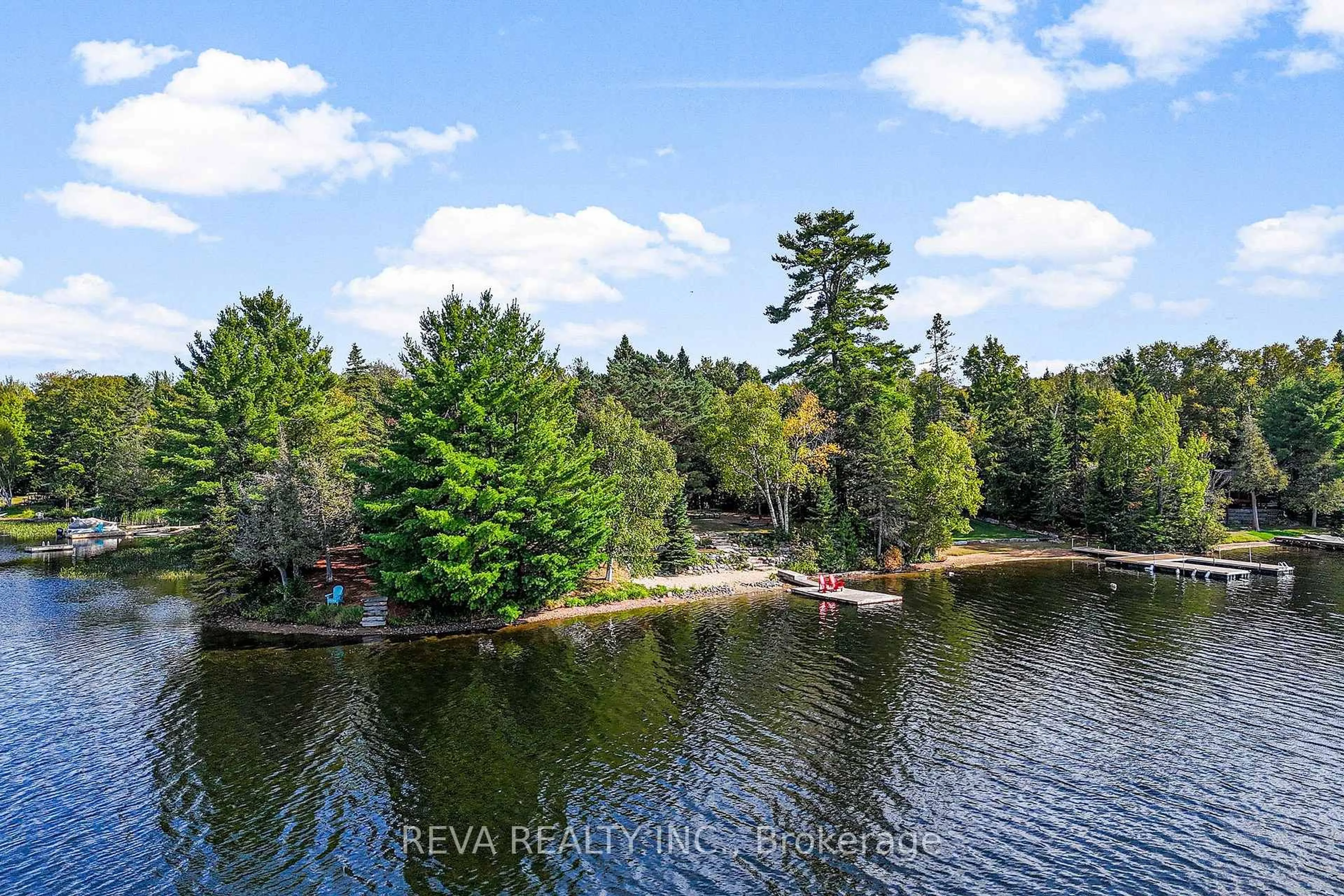 A pic from outside/outdoor area/front of a property/back of a property/a pic from drone, water/lake/river/ocean view for 32 Lake View Lane, Faraday Ontario K0L 1M0