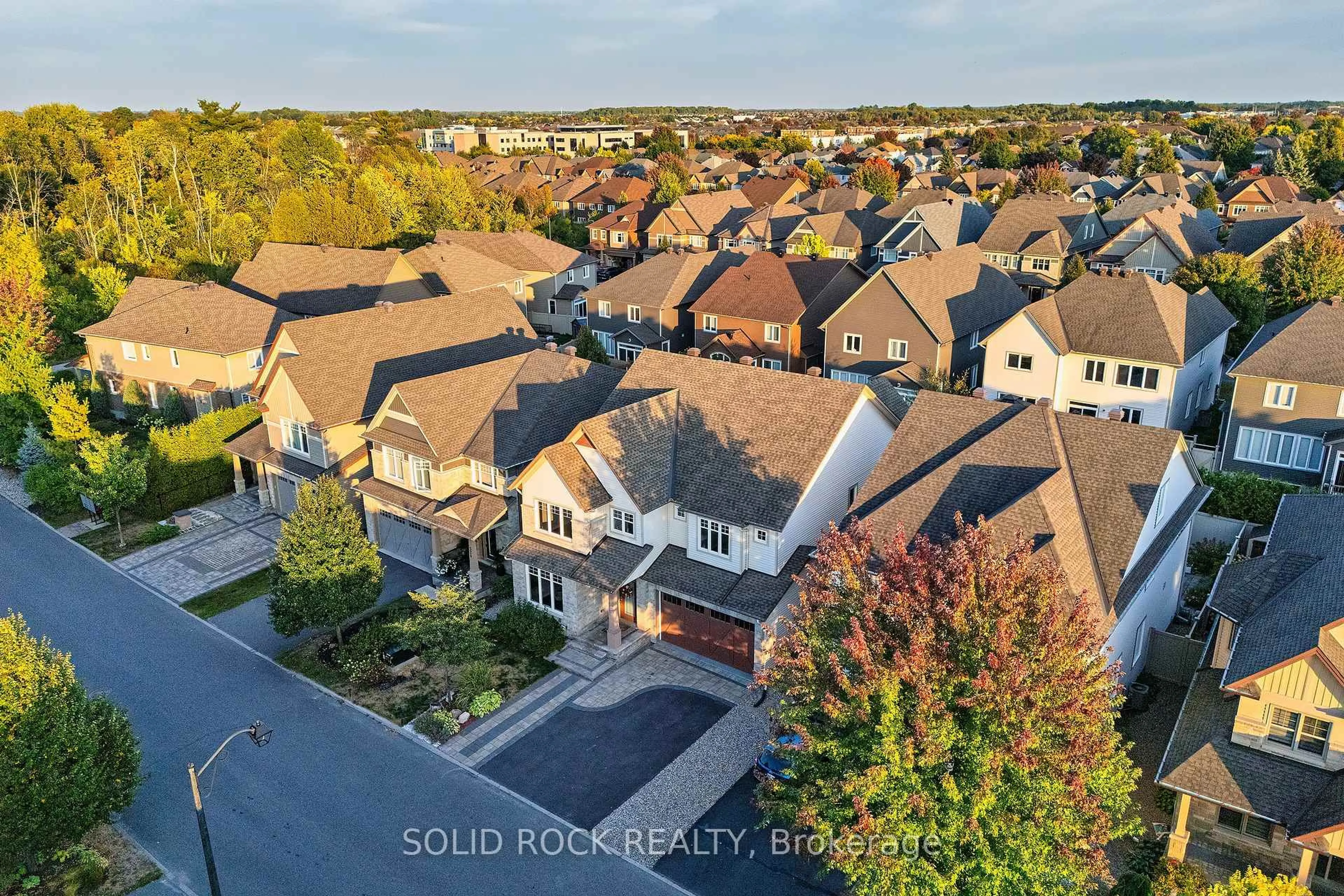 A pic from outside/outdoor area/front of a property/back of a property/a pic from drone, street for 520 Elm Park Ave, Ottawa Ontario K2J 5X9