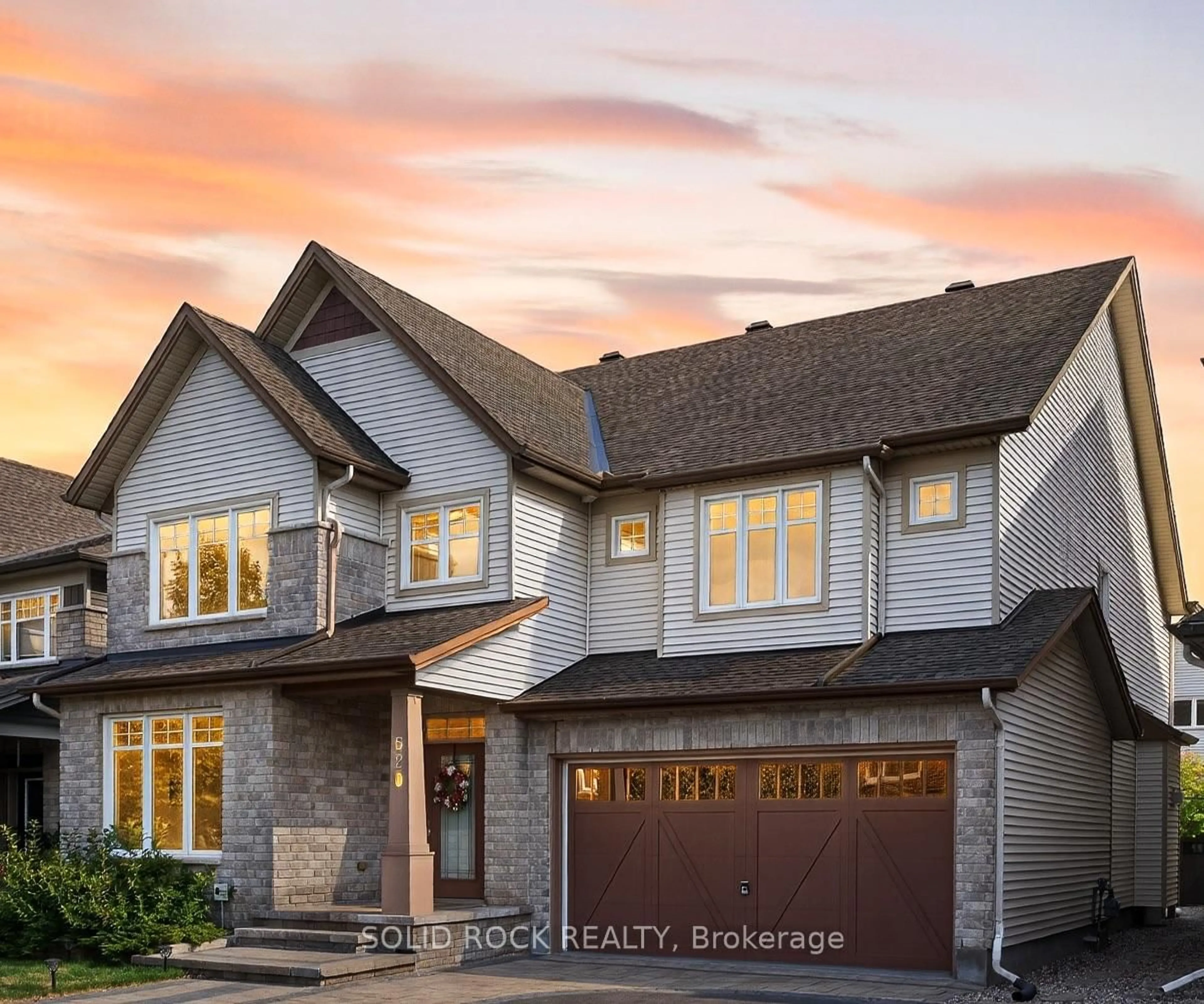 Home with brick exterior material, street for 520 Elm Park Ave, Ottawa Ontario K2J 5X9