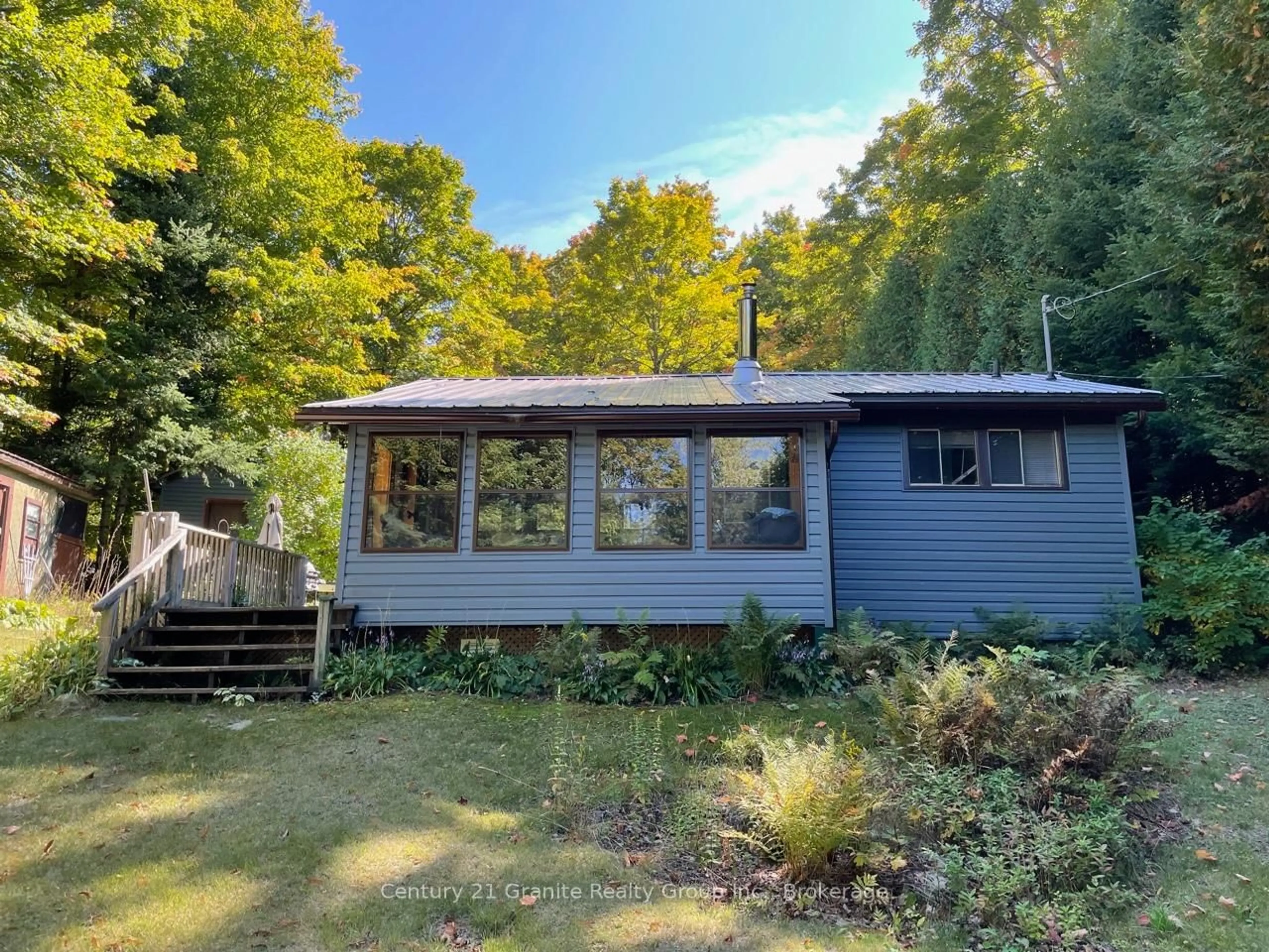 A pic from outside/outdoor area/front of a property/back of a property/a pic from drone, water/lake/river/ocean view for 1052 Kensington Rd, Dysart et al Ontario K0M 1S0