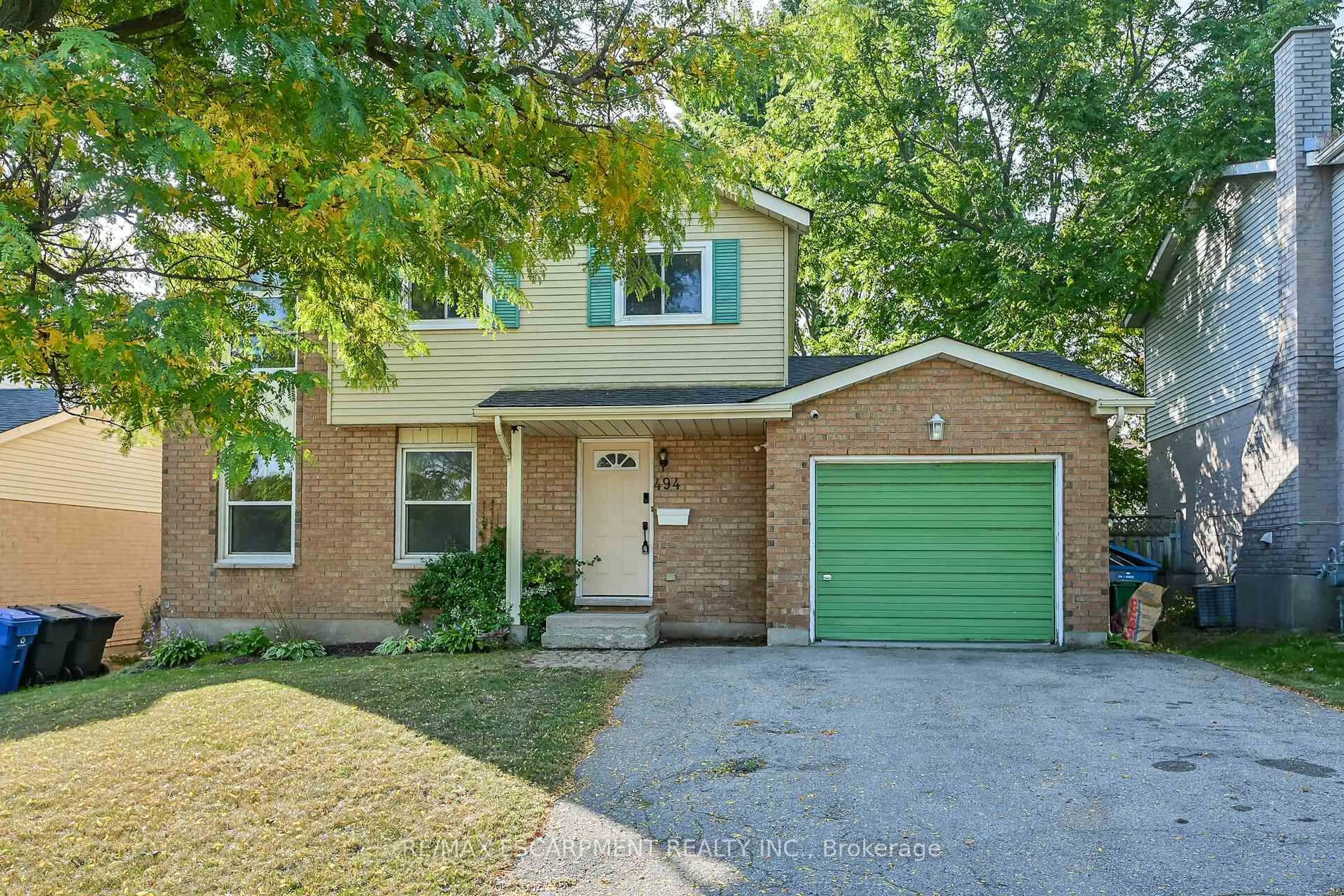 Home with brick exterior material, street for 494 Kortright Rd, Guelph Ontario N1G 3Z1