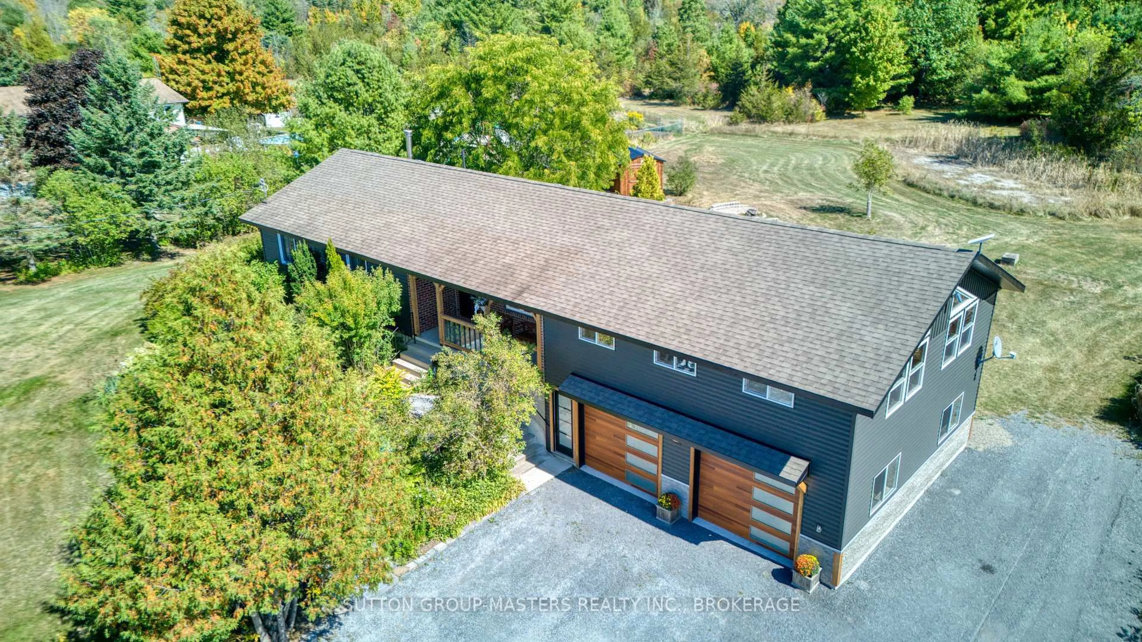 A pic from outside/outdoor area/front of a property/back of a property/a pic from drone, unknown for 66 Colebrook Rd, Yarker Ontario K0K 3N0