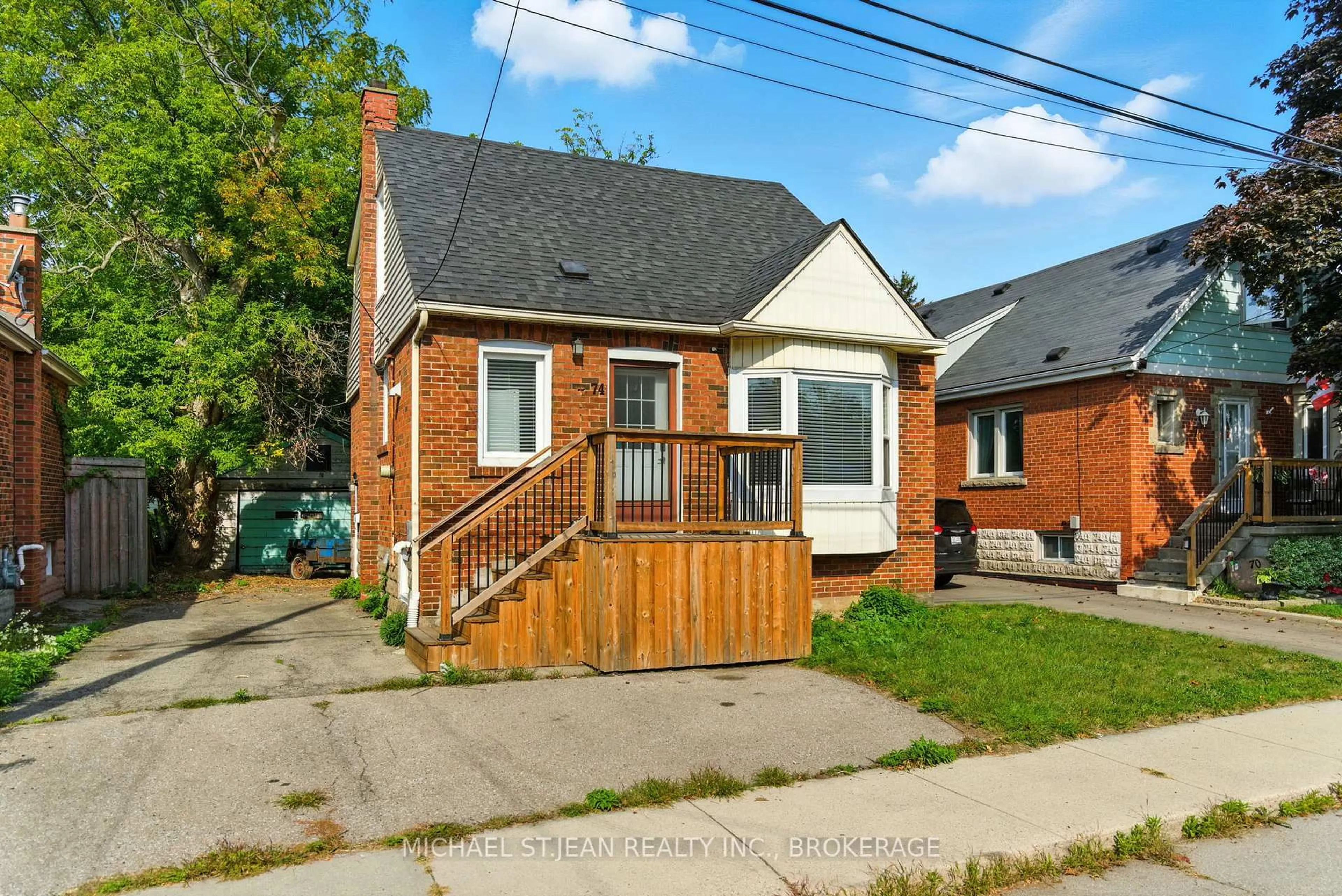 Home with brick exterior material, street for 74 East 14th St, Hamilton Ontario L9A 4B5