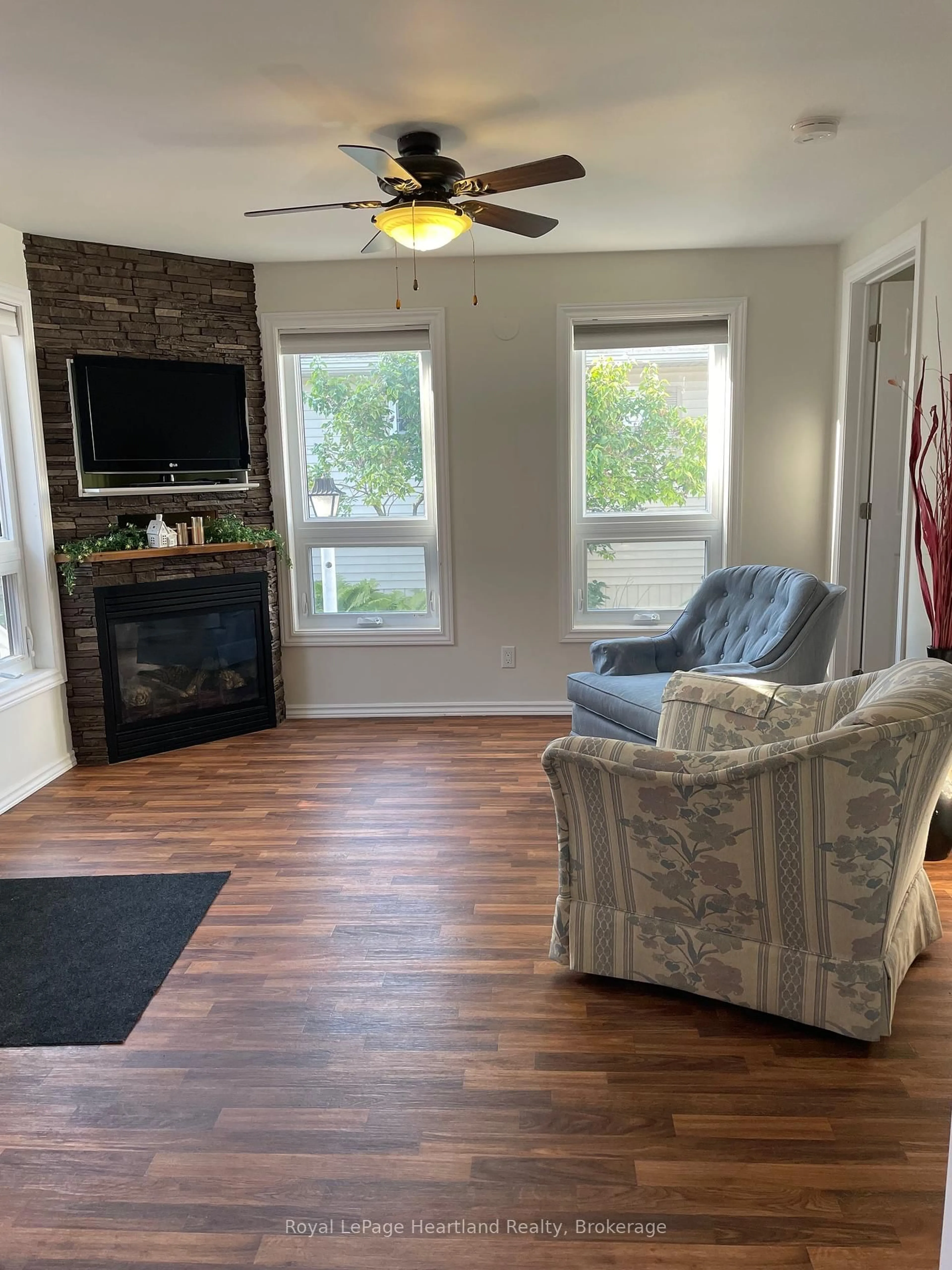 Living room with furniture, wood/laminate floor for 9 ALGONQUIN Lane, Ashfield-Colborne-Wawanosh Ontario N7A 3Y2