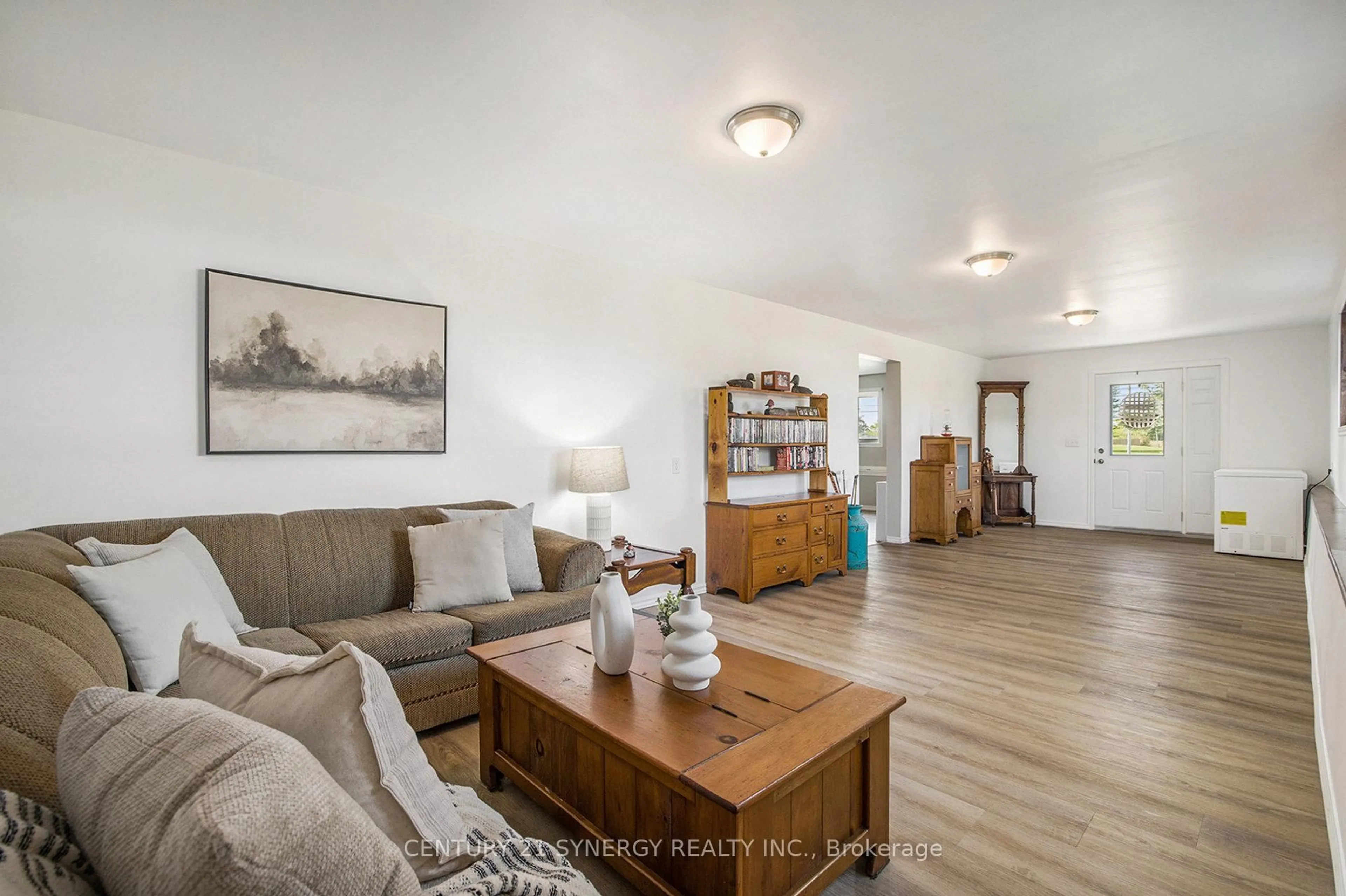 Living room with furniture, wood/laminate floor for 3678 Highway 43 W Rd, Smiths Falls Ontario K7A 4S4