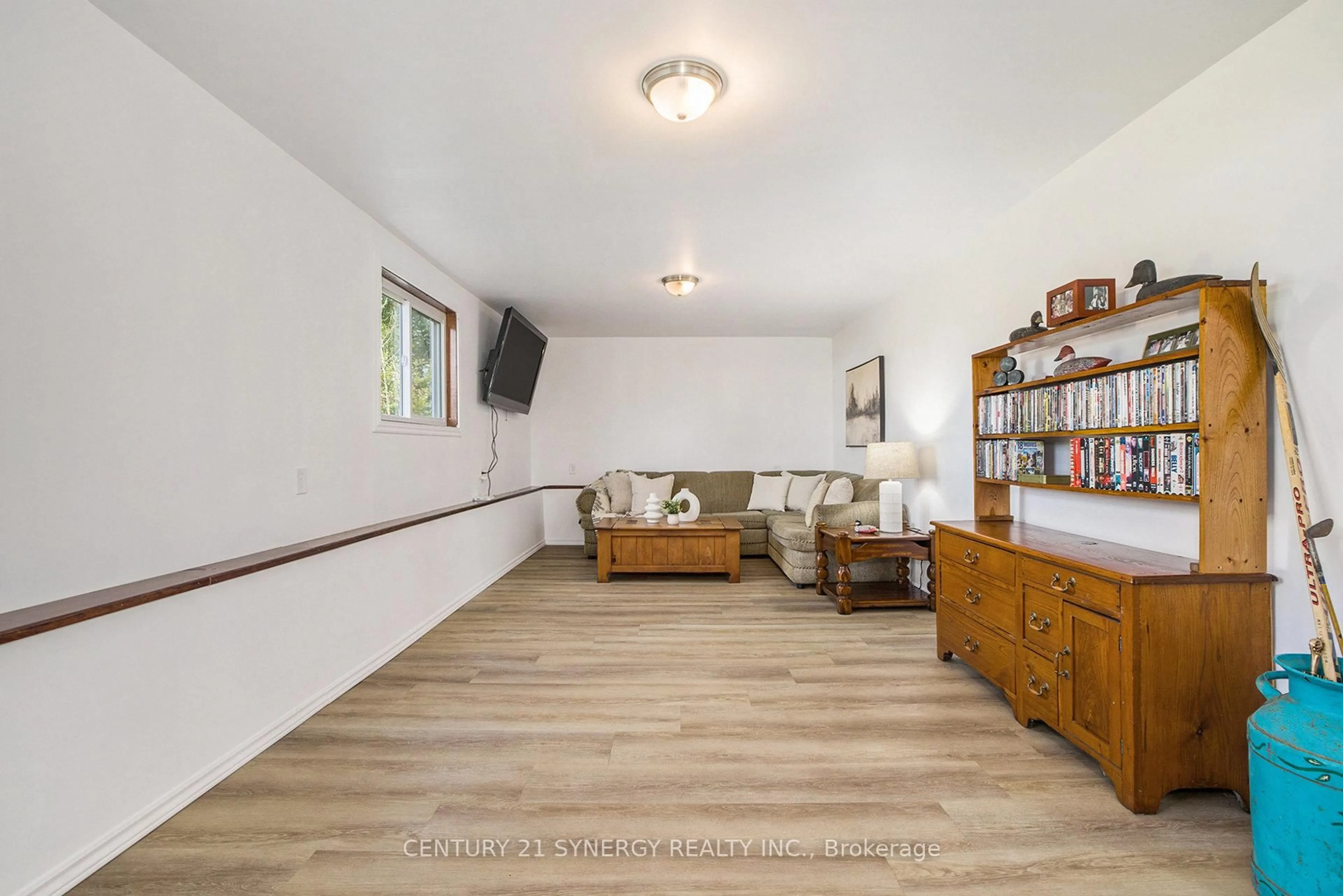 Living room with furniture, wood/laminate floor for 3678 Highway 43 W Rd, Smiths Falls Ontario K7A 4S4