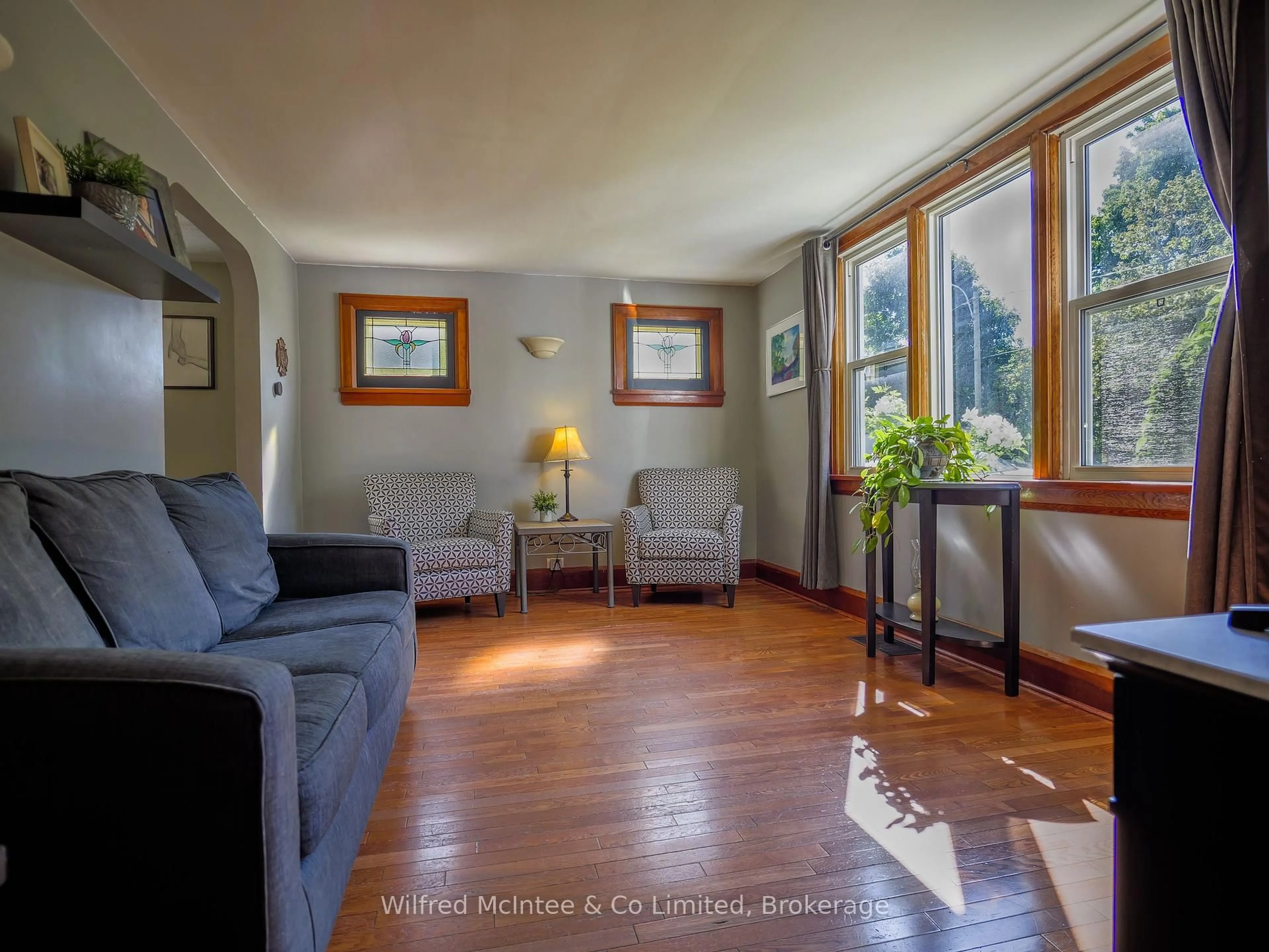 Living room with furniture, wood/laminate floor for 304 Napier St, Brockton Ontario N0G 2V0