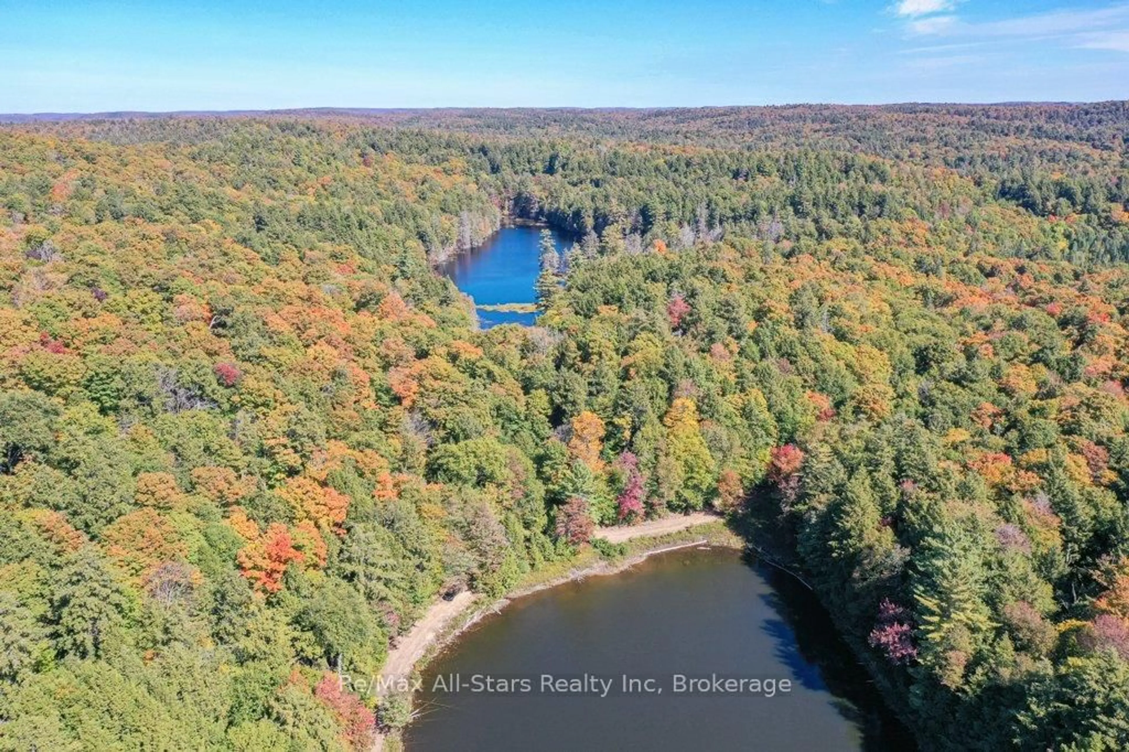 A pic from outside/outdoor area/front of a property/back of a property/a pic from drone, water/lake/river/ocean view for 0 Harris Rd, Algonquin Highlands Ontario P0A 1H0