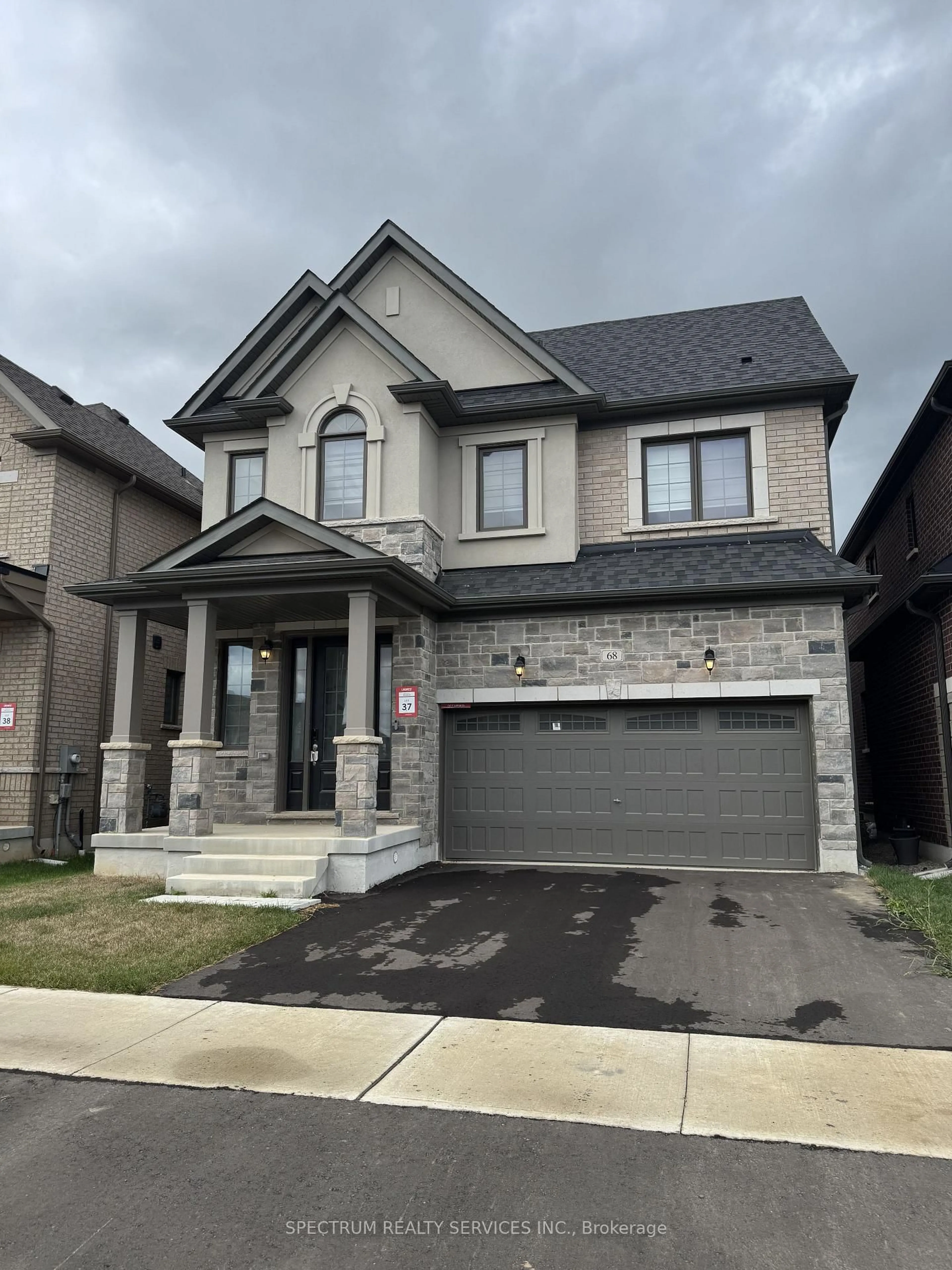 Home with brick exterior material, street for 68 Granka St, Brantford Ontario N3T 0X4