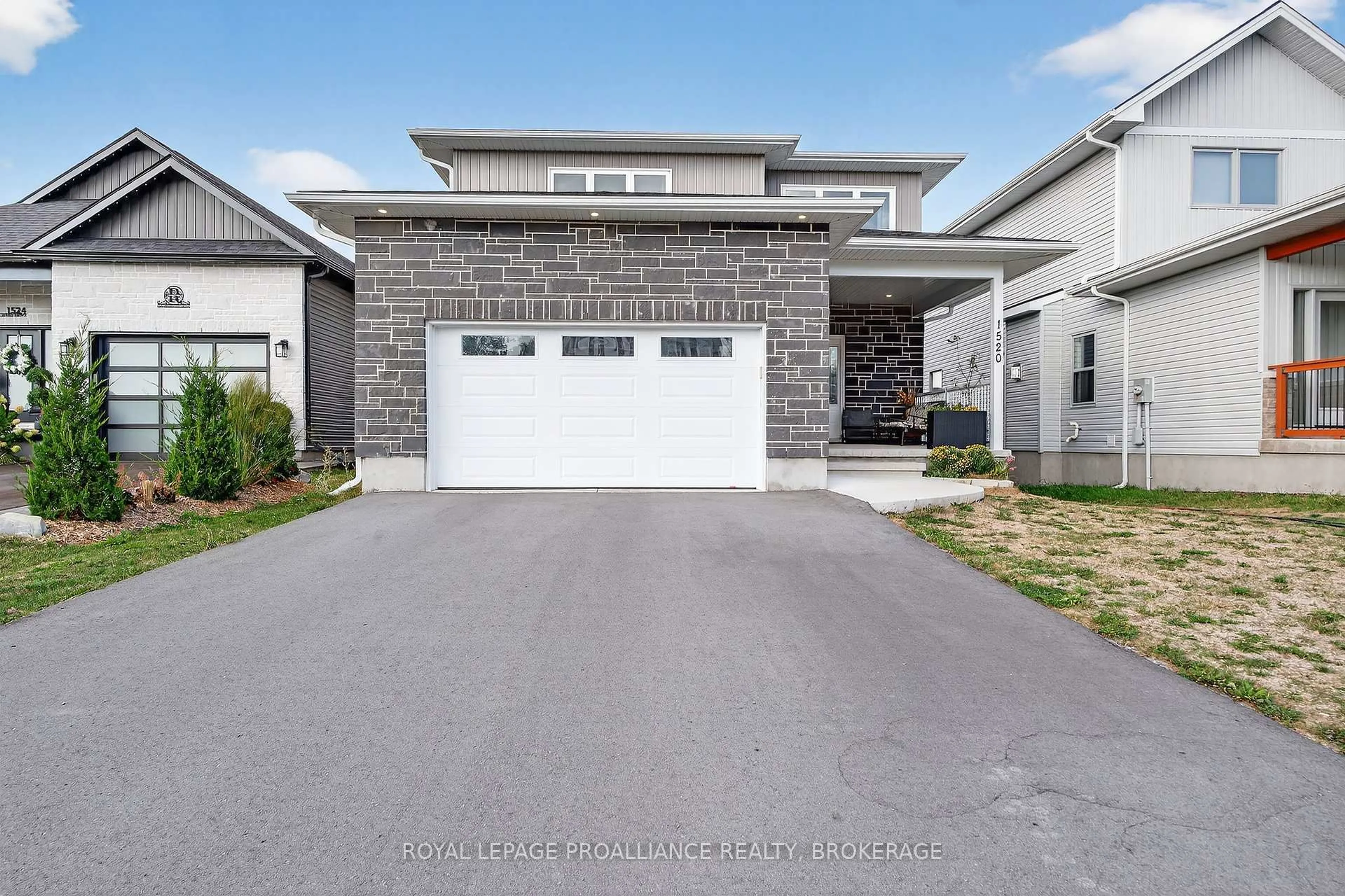 Home with vinyl exterior material, street for 1520 Berkshire Dr, Kingston Ontario K7P 0S7