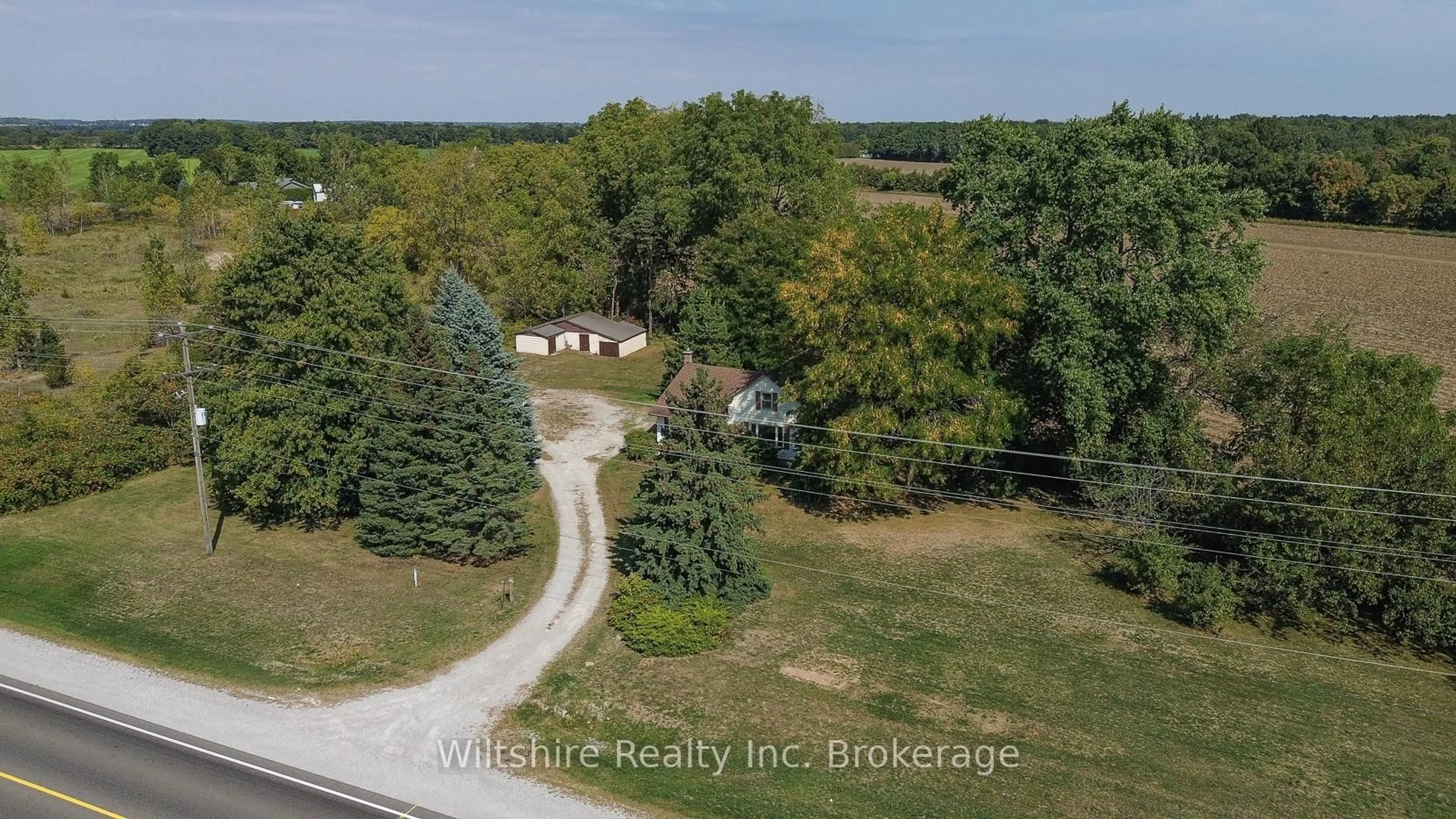 A pic from outside/outdoor area/front of a property/back of a property/a pic from drone, unknown for 365 Highway 3 Highway, Norfolk Ontario N0J 1E0