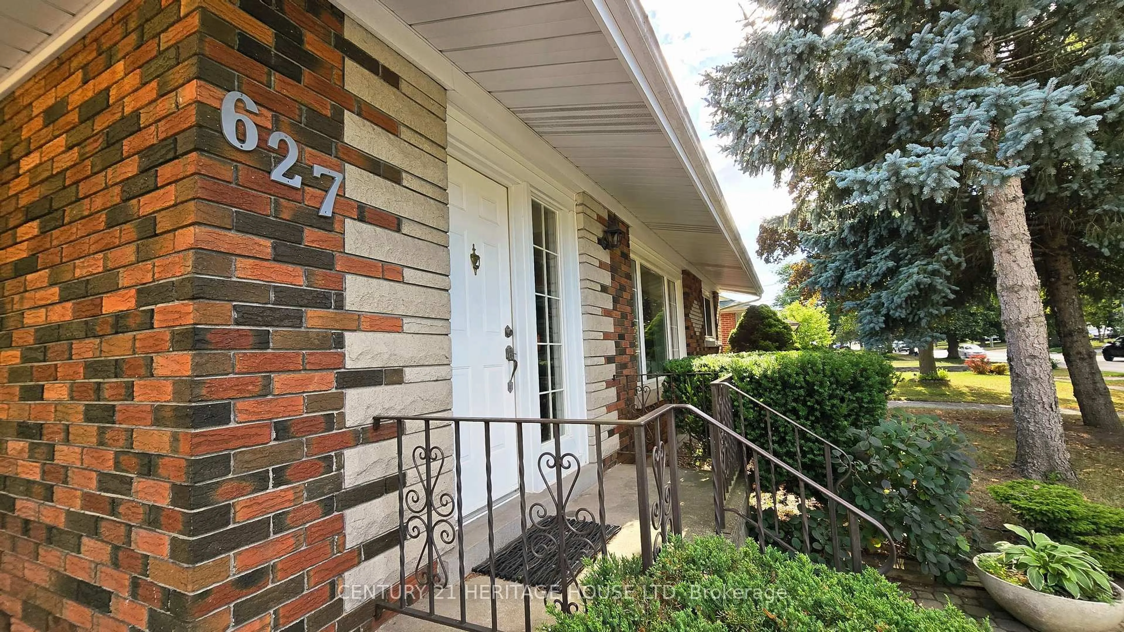 Home with brick exterior material, street for 627 Krug St, Kitchener Ontario N2B 1L9