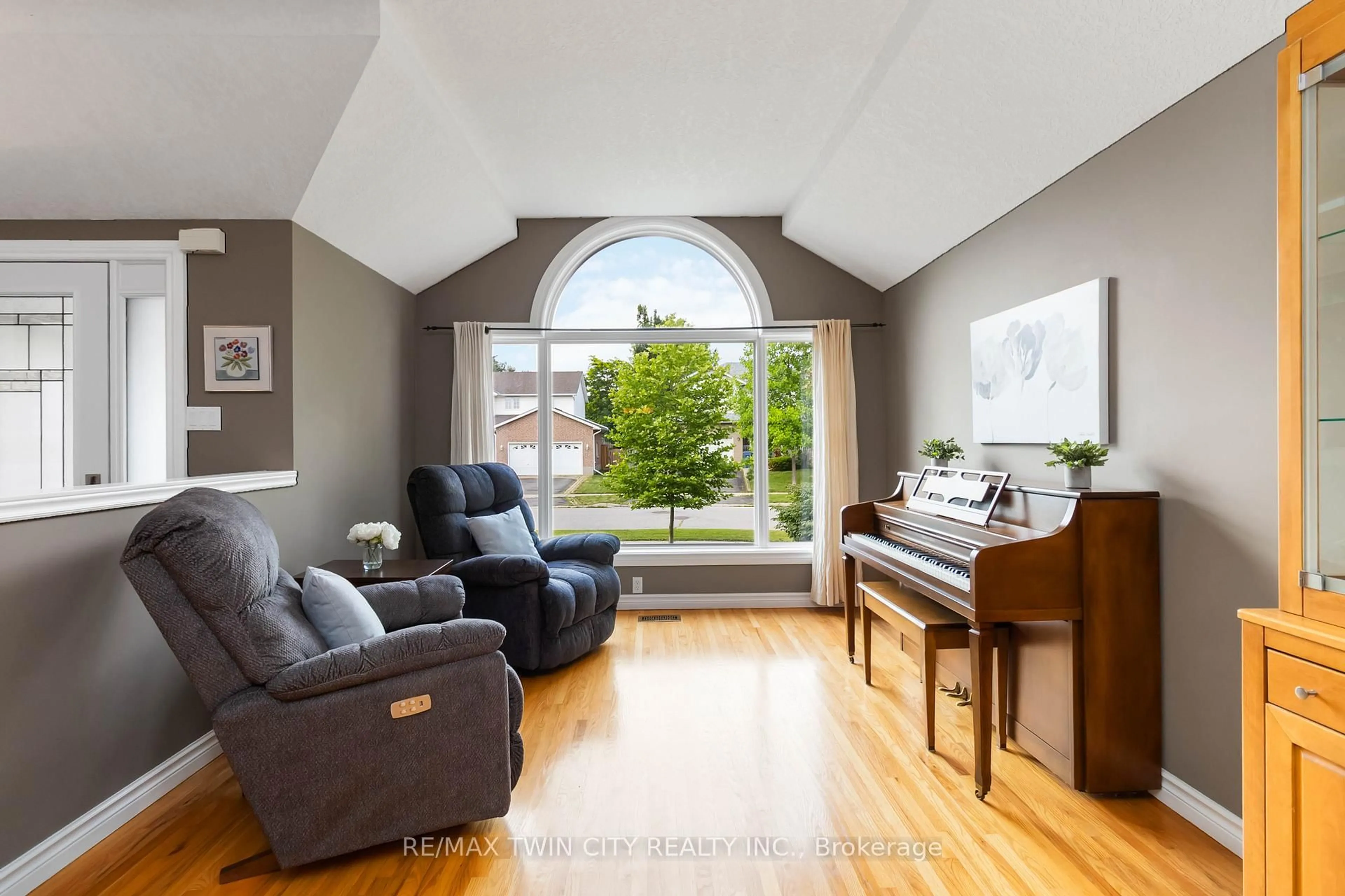 Living room with furniture, wood/laminate floor for 42 Sandpiper Dr, Guelph Ontario N1C 1C9