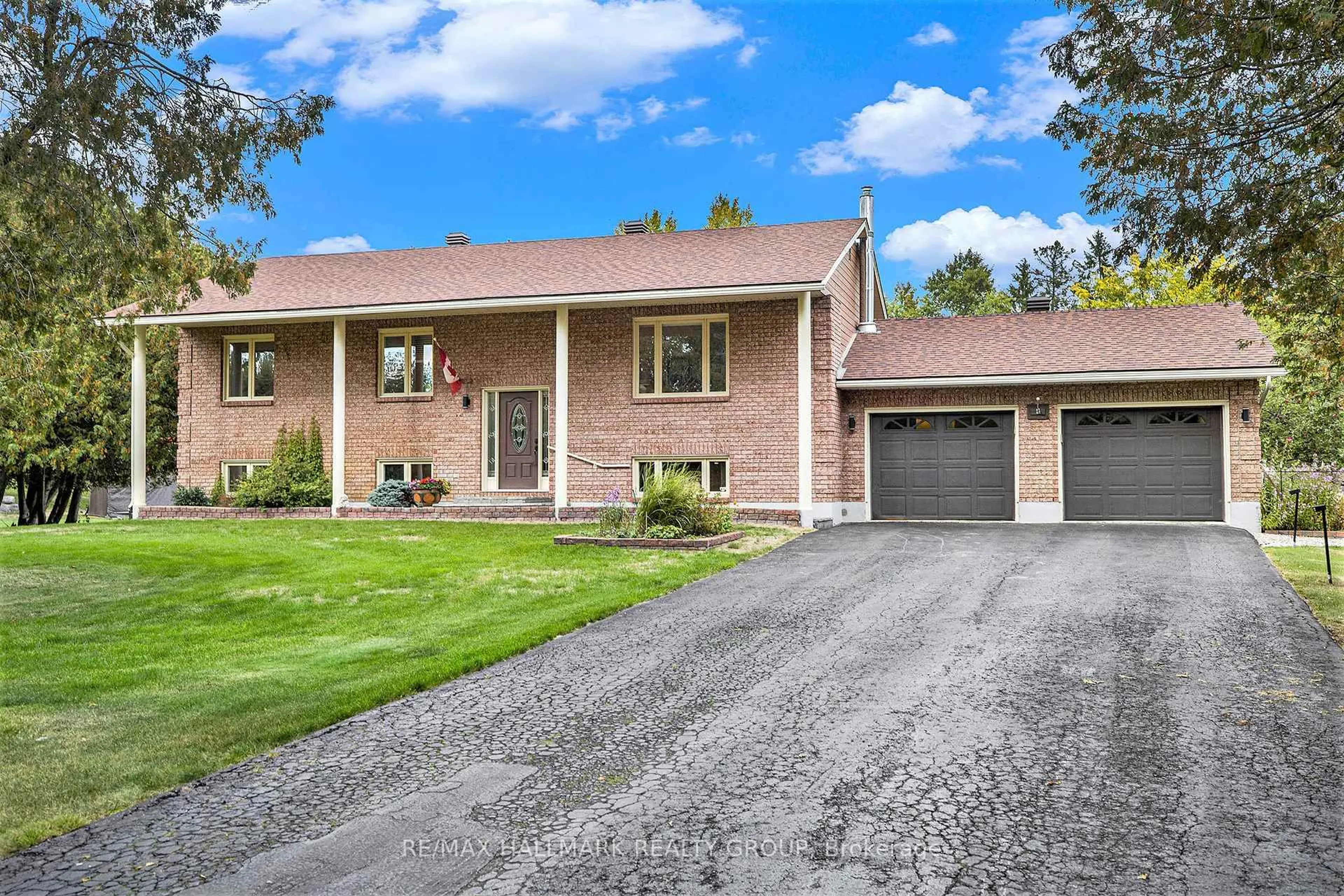 Home with brick exterior material, street for 115 Delaney Dr, Carp Ontario K0A 1L0