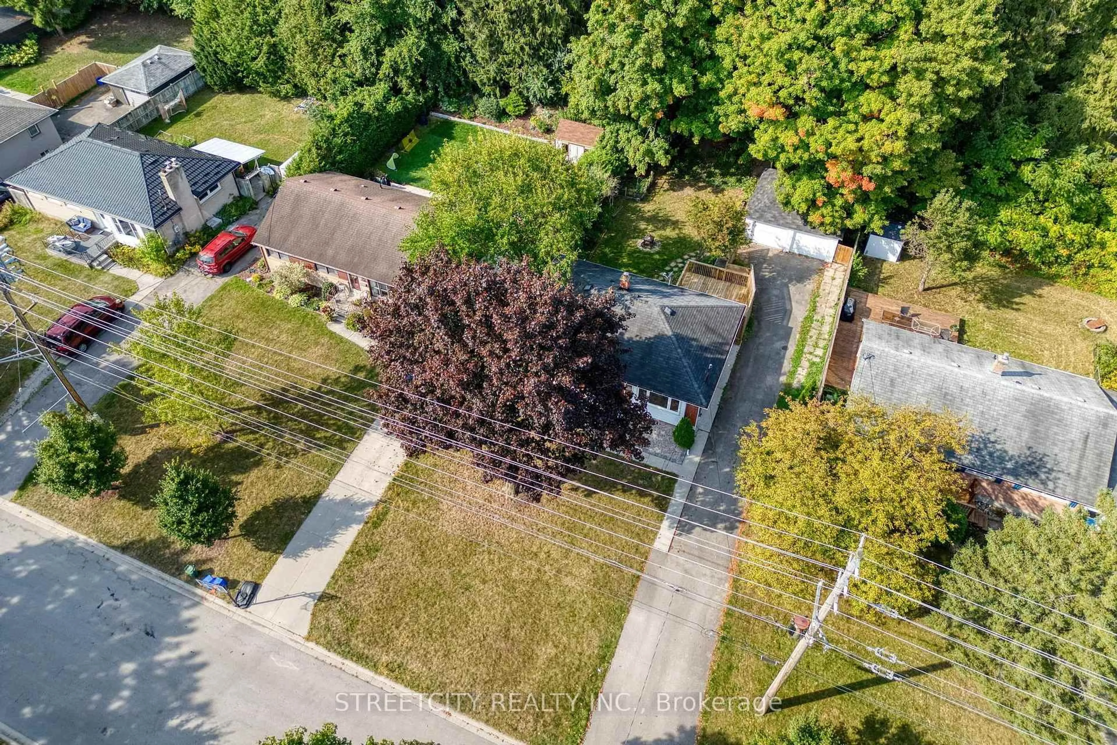 A pic from outside/outdoor area/front of a property/back of a property/a pic from drone, street for 167 Trowbridge Ave, London South Ontario N6J 3M2