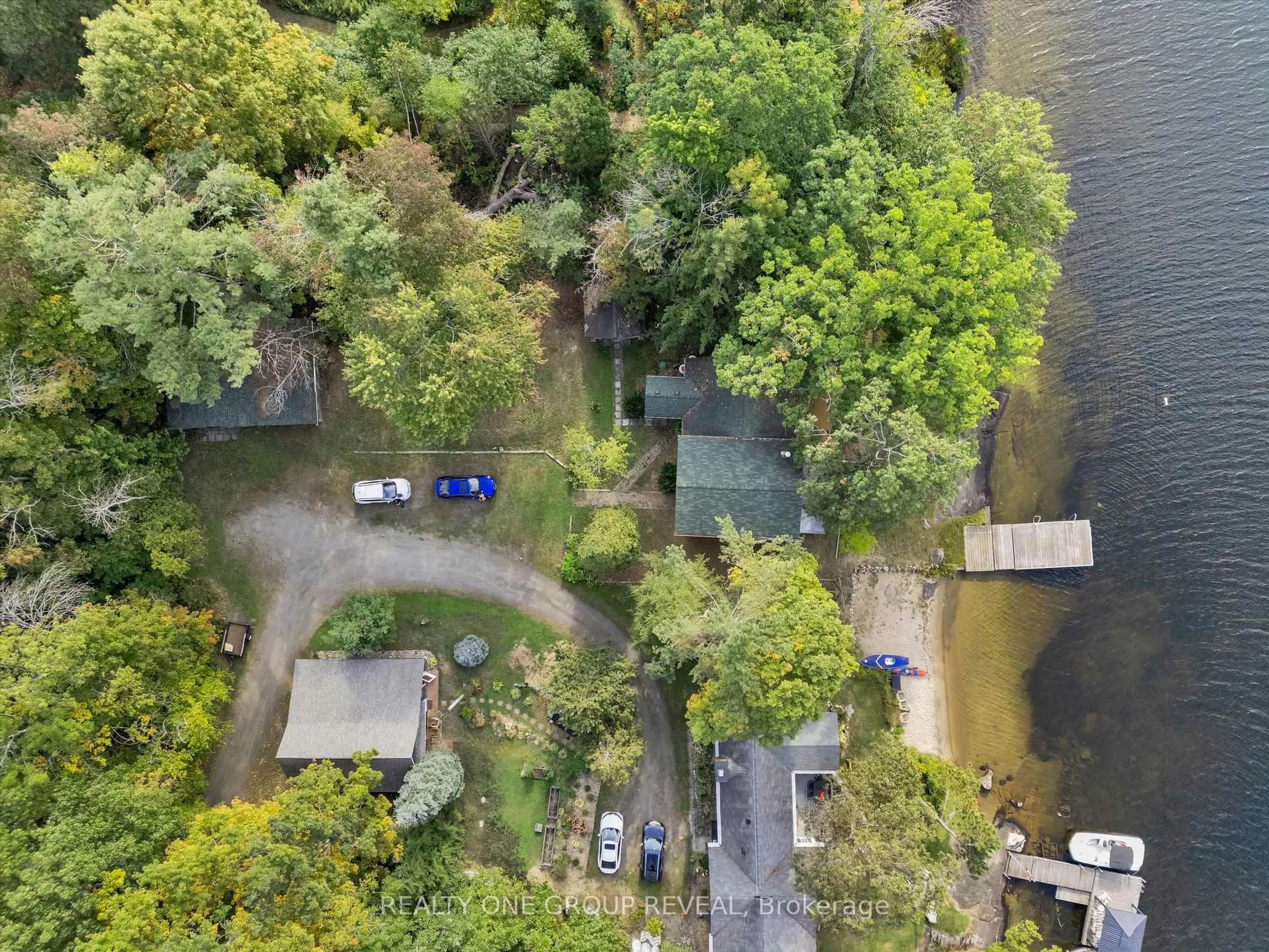 A pic from outside/outdoor area/front of a property/back of a property/a pic from drone, water/lake/river/ocean view for 1067 River St #2, Muskoka Lakes Ontario L1L 0T1