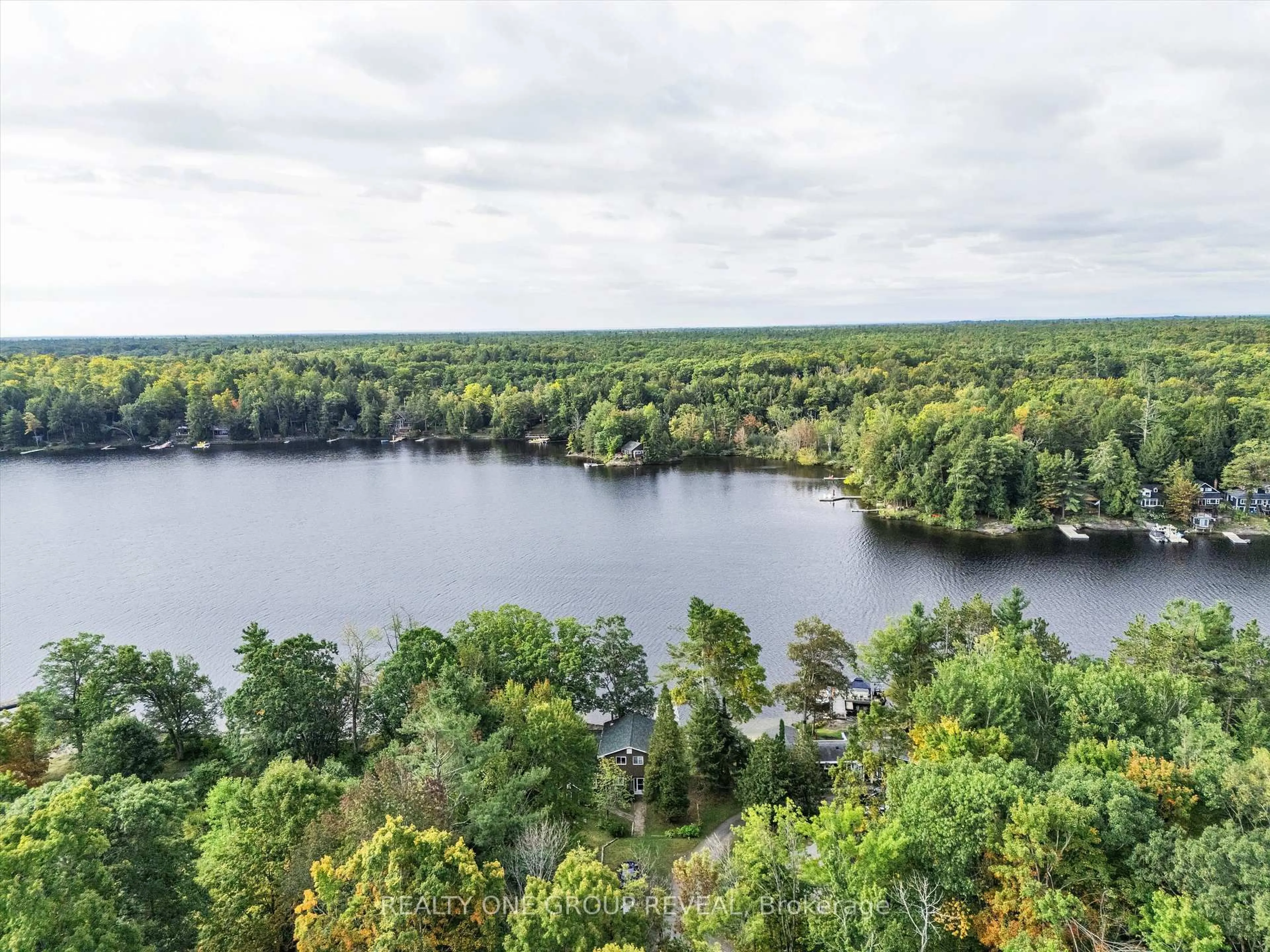 A pic from outside/outdoor area/front of a property/back of a property/a pic from drone, water/lake/river/ocean view for 1067 River St #2, Muskoka Lakes Ontario L1L 0T1