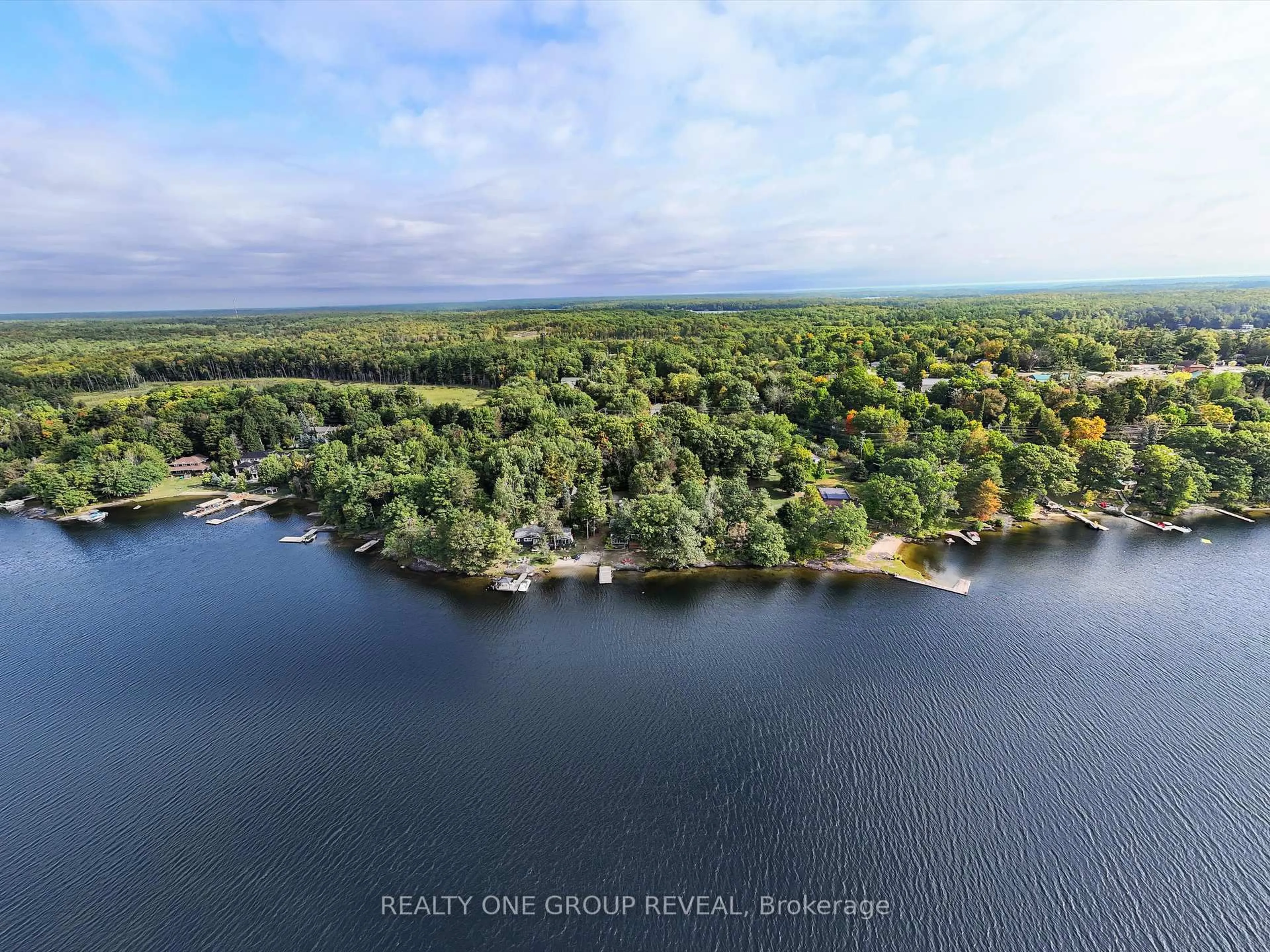 A pic from outside/outdoor area/front of a property/back of a property/a pic from drone, water/lake/river/ocean view for 1067 River St #2, Muskoka Lakes Ontario L1L 0T1