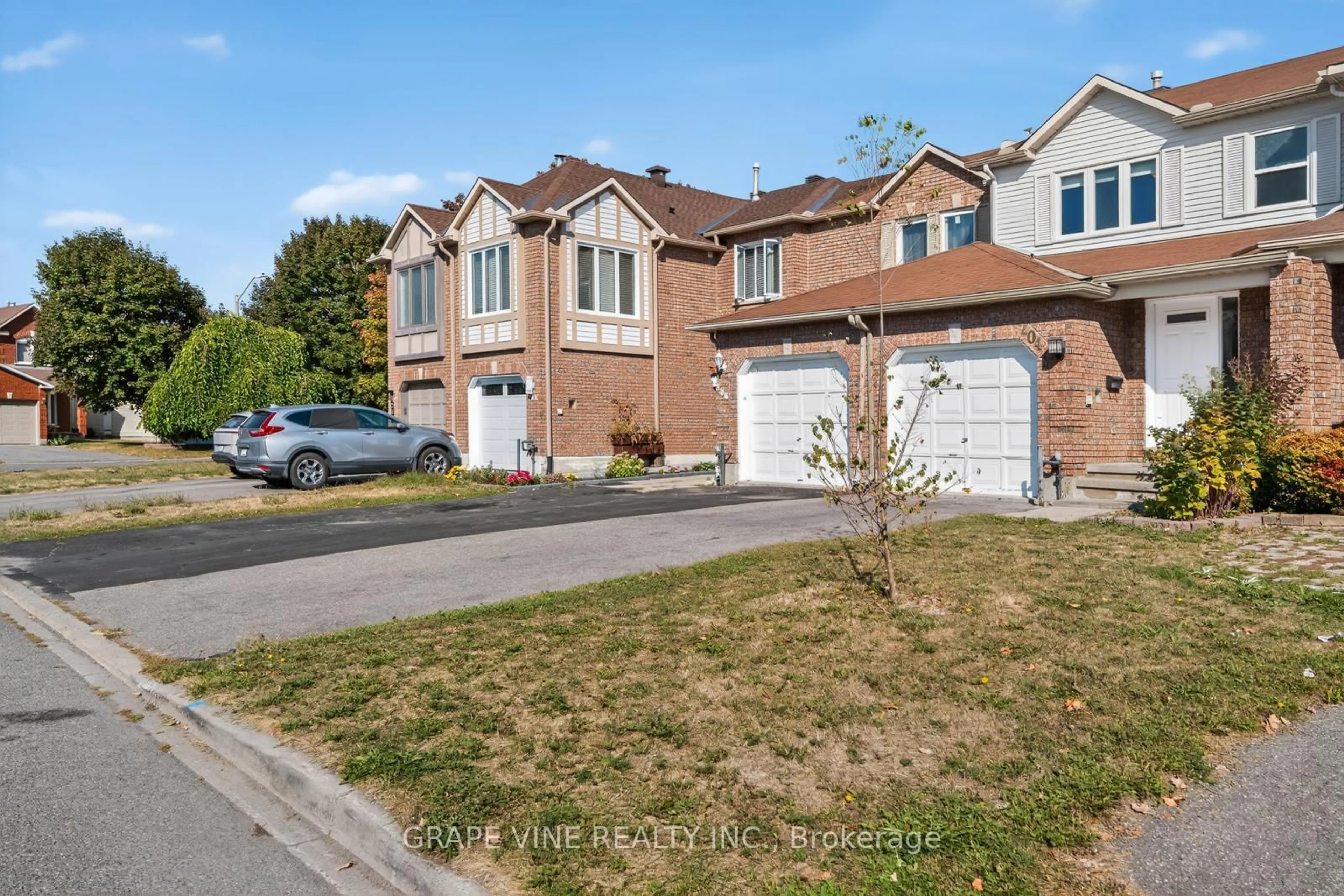 Home with brick exterior material, street for 204 Hunterswood Cres, Ottawa Ontario K1G 5V1