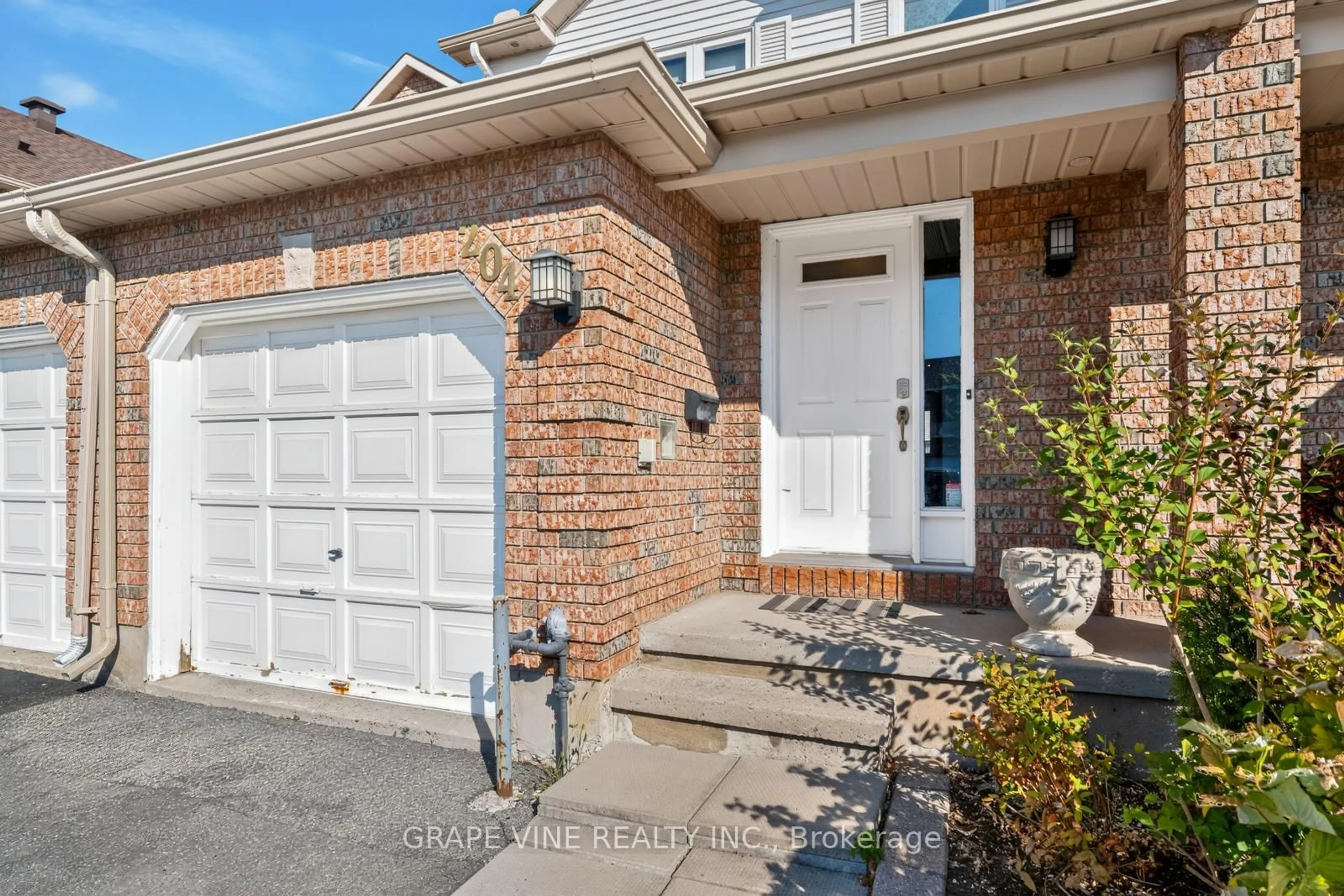 Home with brick exterior material, street for 204 Hunterswood Cres, Ottawa Ontario K1G 5V1