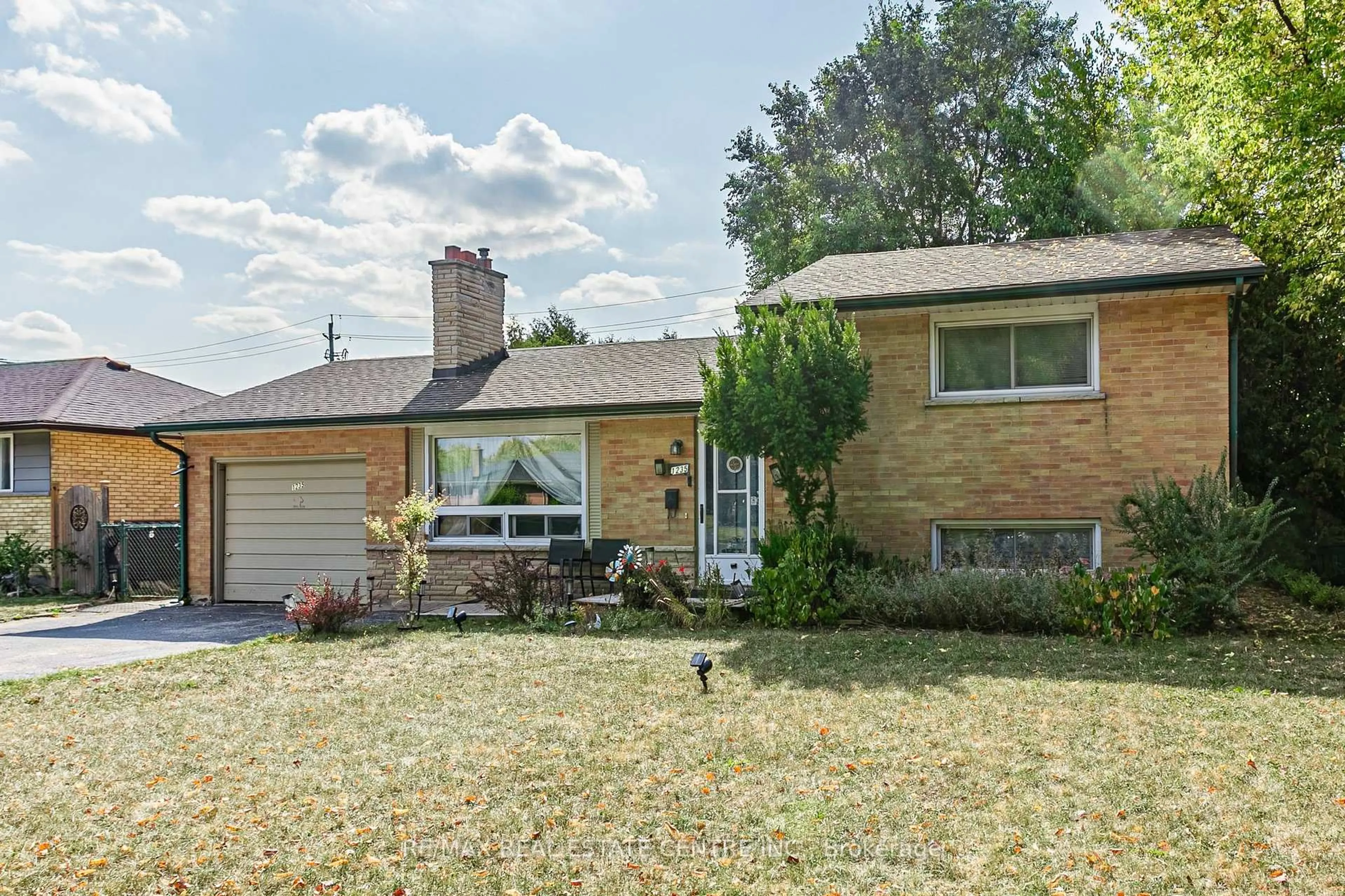Home with brick exterior material, street for 1235 TOUKAY Cres, London East Ontario N5V 2X8