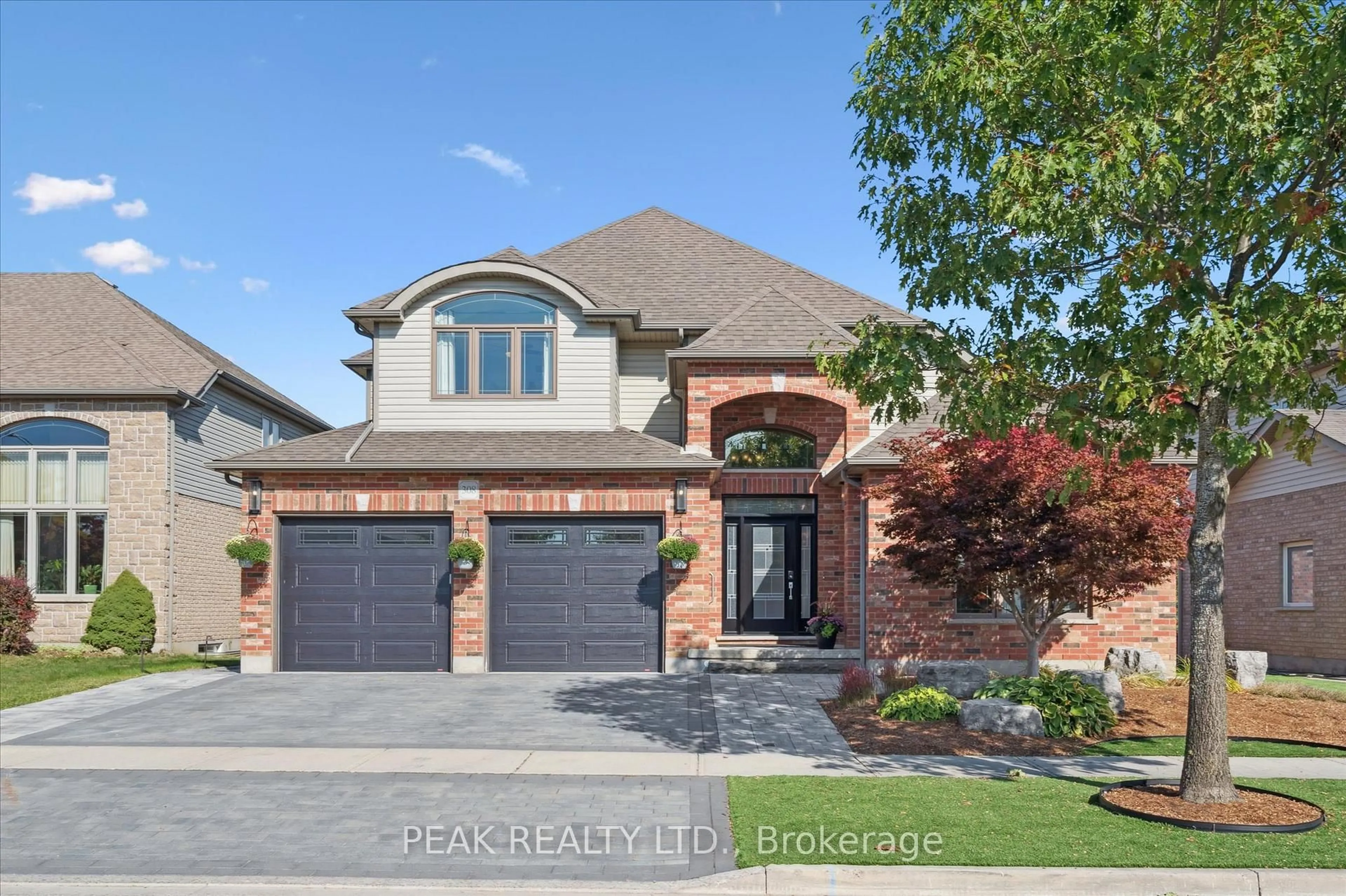 Home with brick exterior material, street for 308 Townsend Dr, Woolwich Ontario N0B 1M0