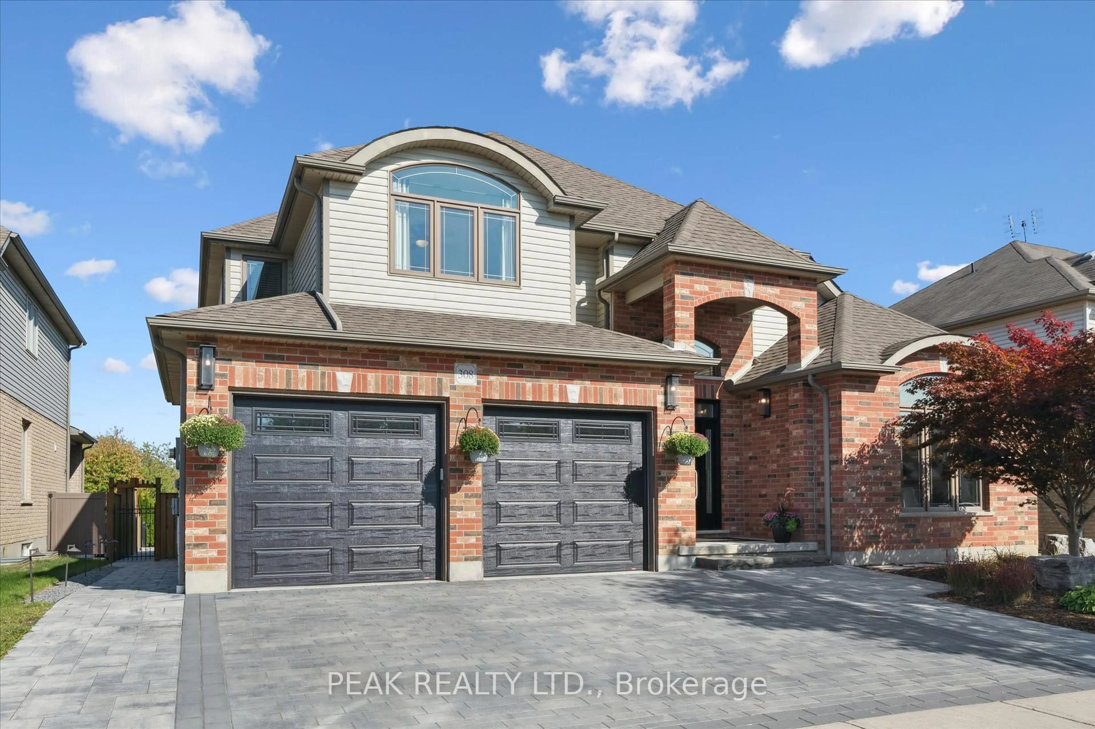 Home with brick exterior material, street for 308 Townsend Dr, Woolwich Ontario N0B 1M0