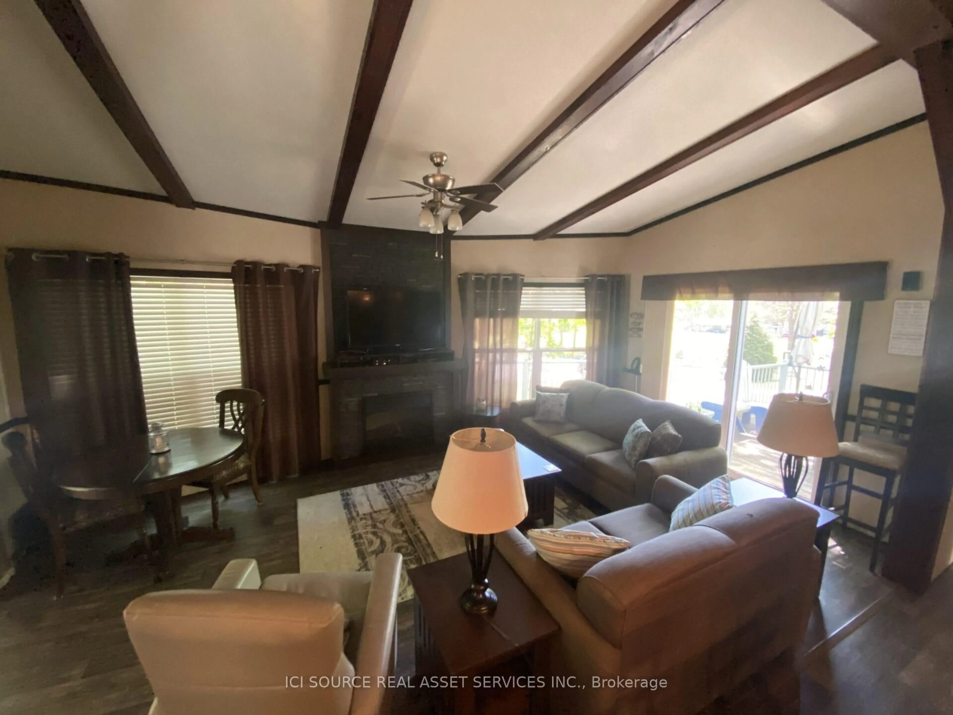 Living room with furniture, unknown for 1082 Shamrock Marina Rd #SMR114, Gravenhurst Ontario P0E 1N0