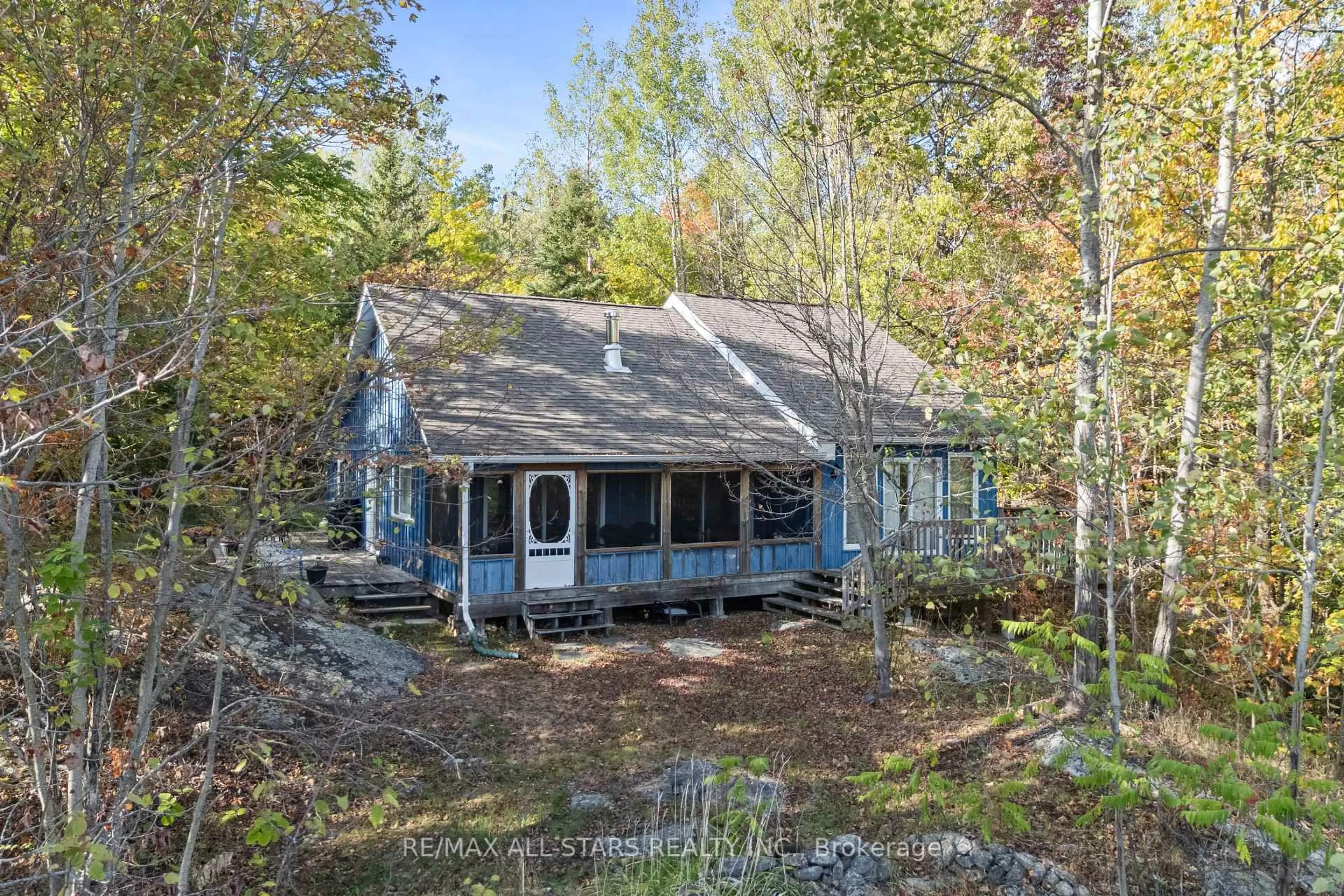 A pic from outside/outdoor area/front of a property/back of a property/a pic from drone, unknown for 1142 English Circ, Highlands East Ontario K0M 1R0