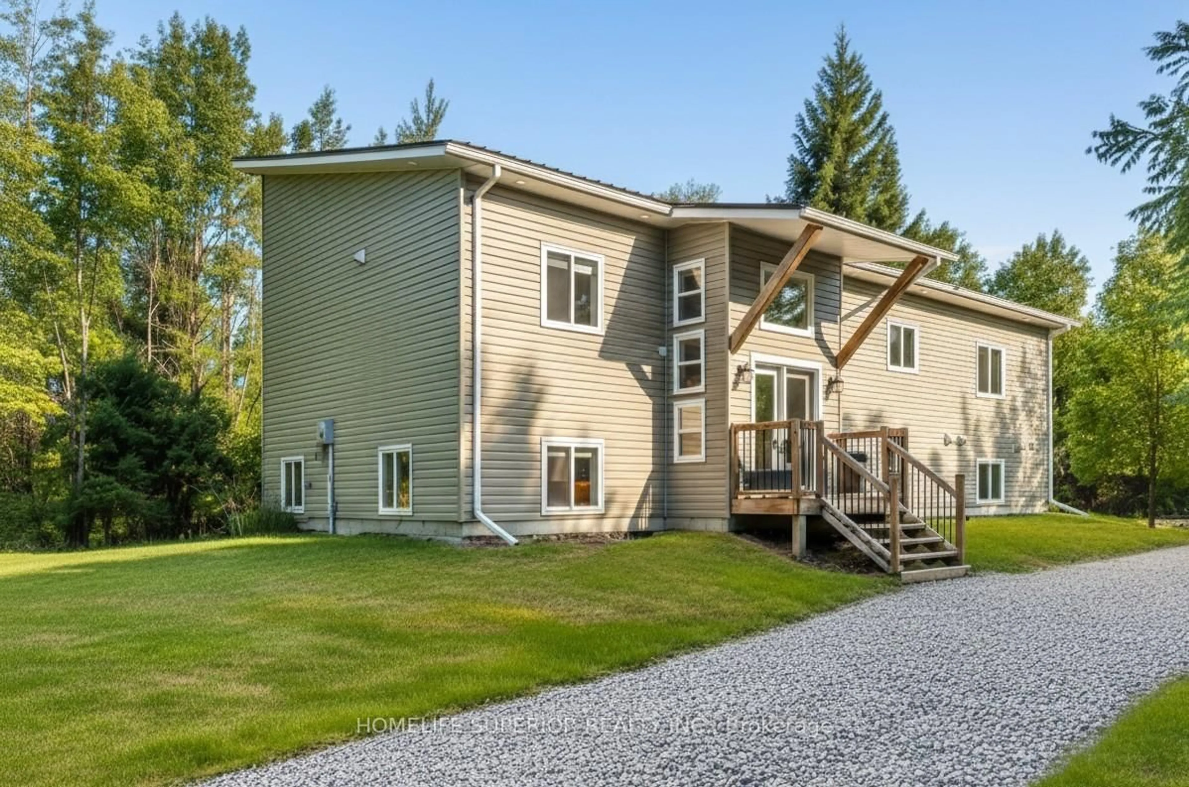 Home with vinyl exterior material, mountain view for 16213 Highway 62, Madoc Ontario K0K 1Y0