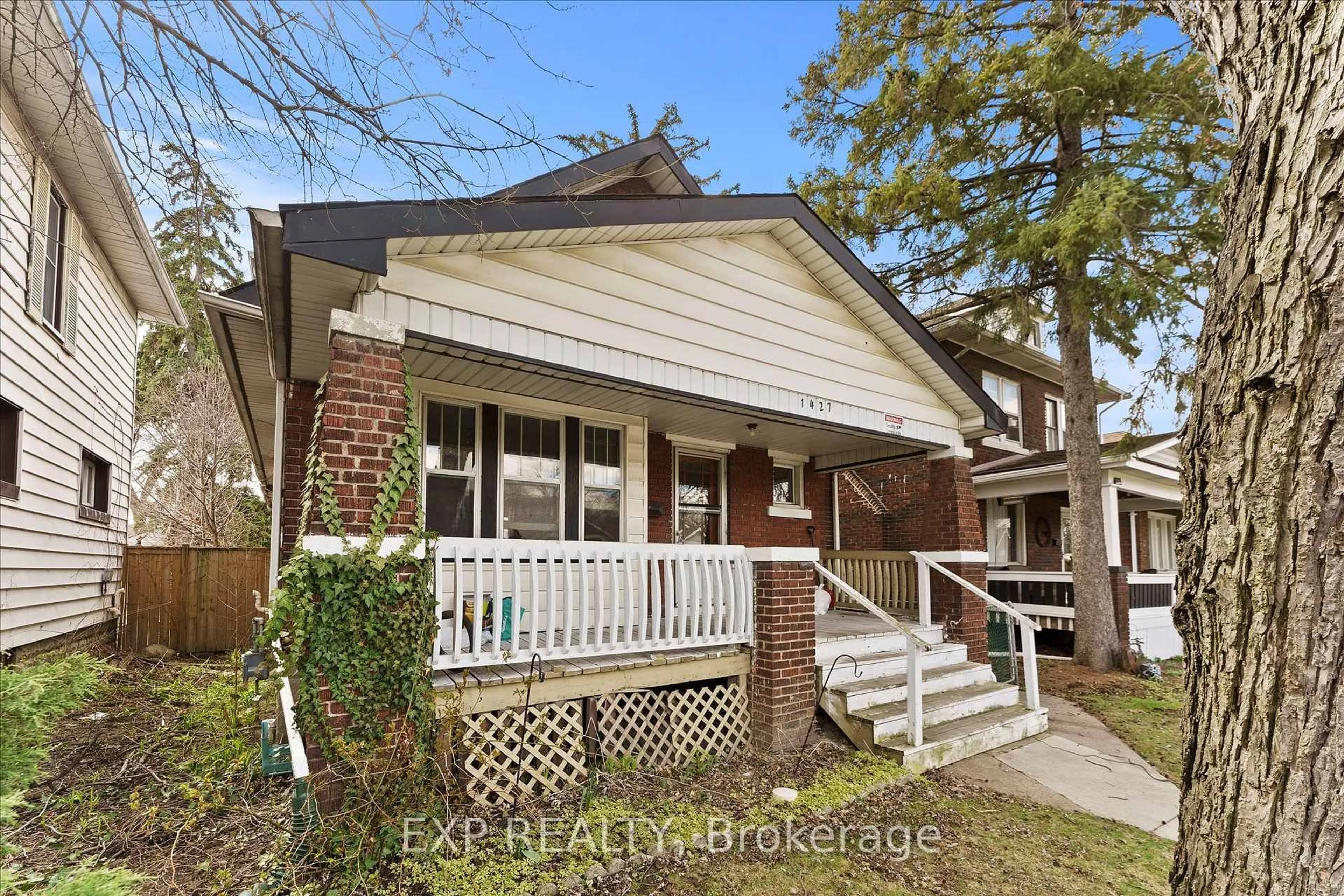 Home with brick exterior material, street for 1427 Bruce Ave, Windsor Ontario N8X 1X6