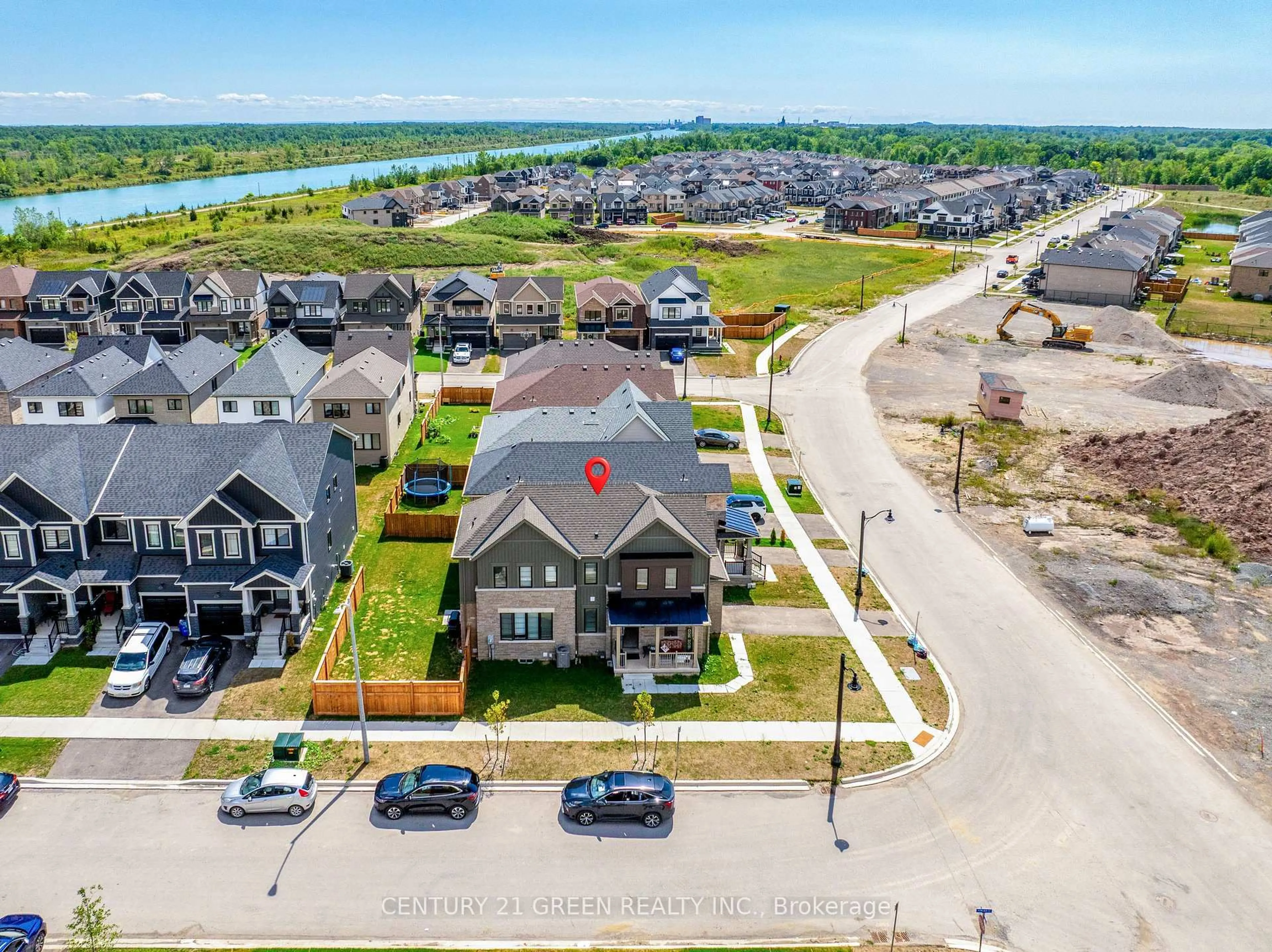 A pic from outside/outdoor area/front of a property/back of a property/a pic from drone, water/lake/river/ocean view for 414 Eastbridge Ave, Welland Ontario L3B 0M7
