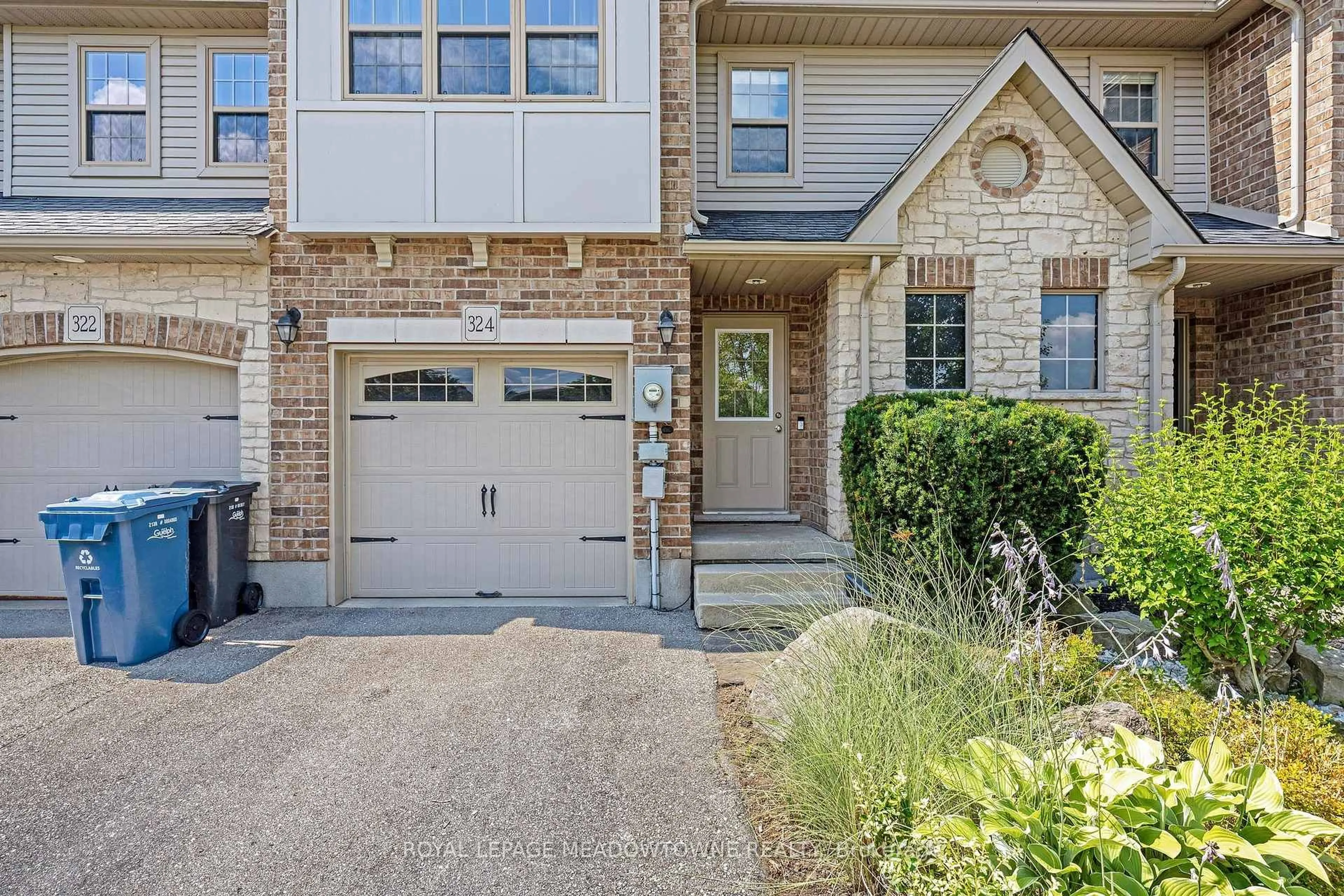 Home with brick exterior material, street for 324 Severn Dr, Guelph Ontario N1E 0E9