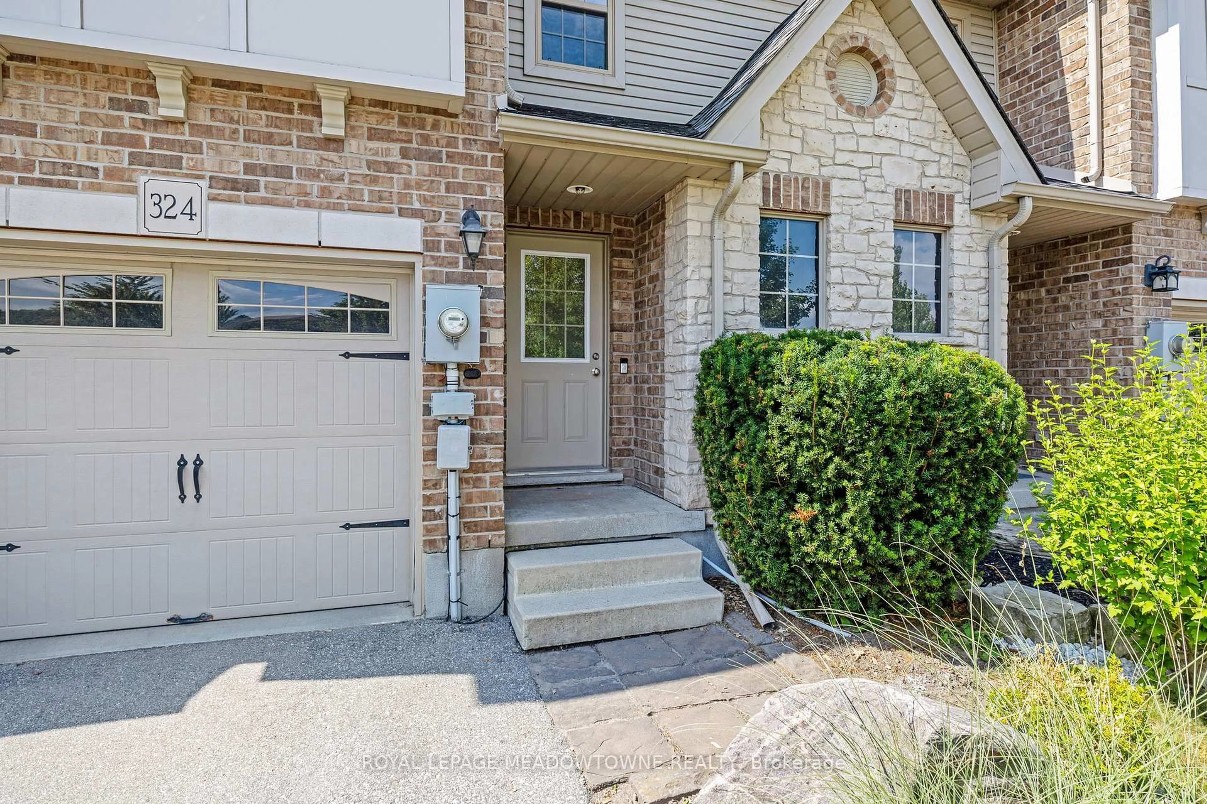 Home with brick exterior material, street for 324 Severn Dr, Guelph Ontario N1E 0E9