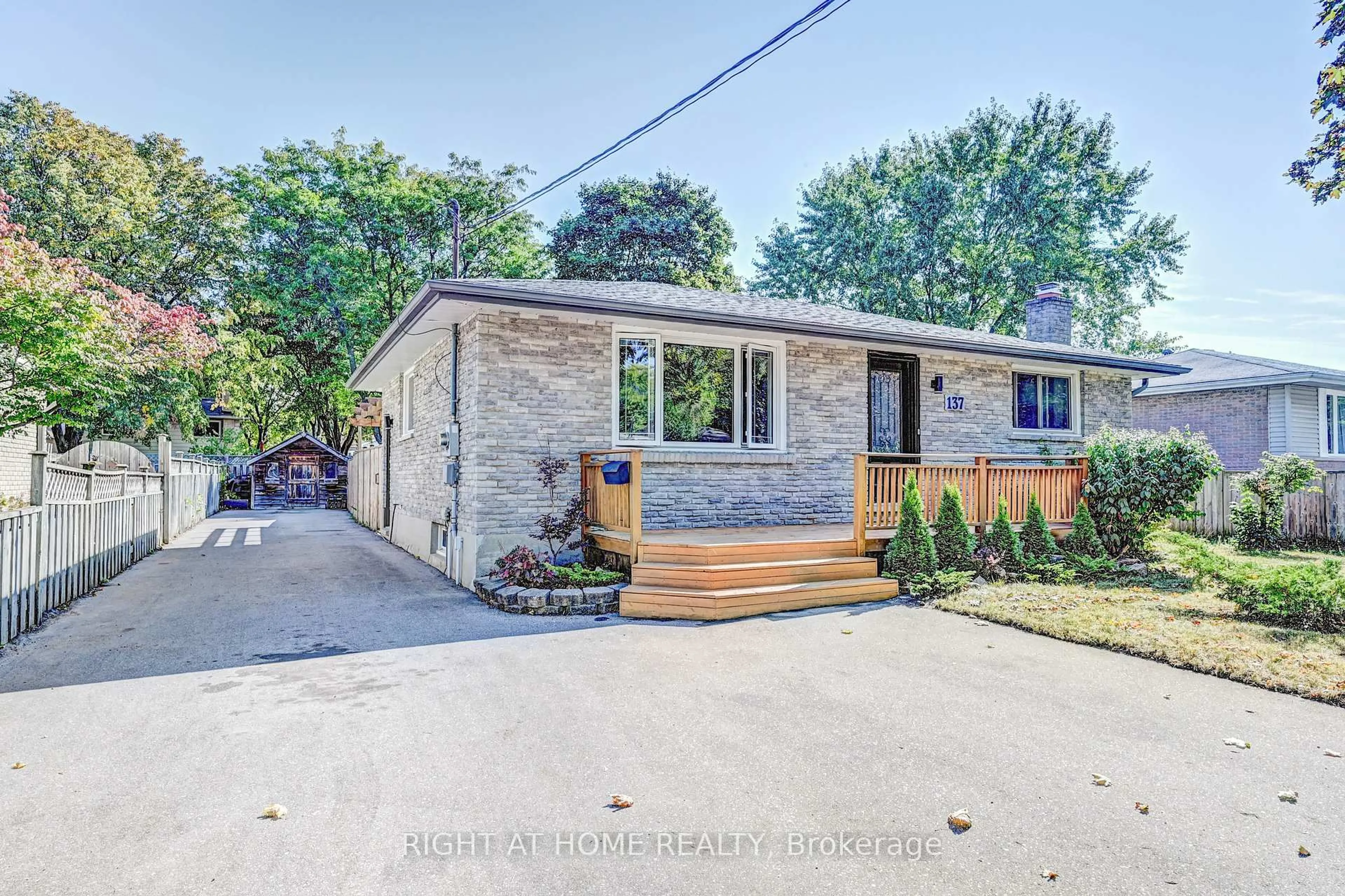 Home with brick exterior material, street for 137 Country Club Dr, Guelph Ontario N1E 3K8