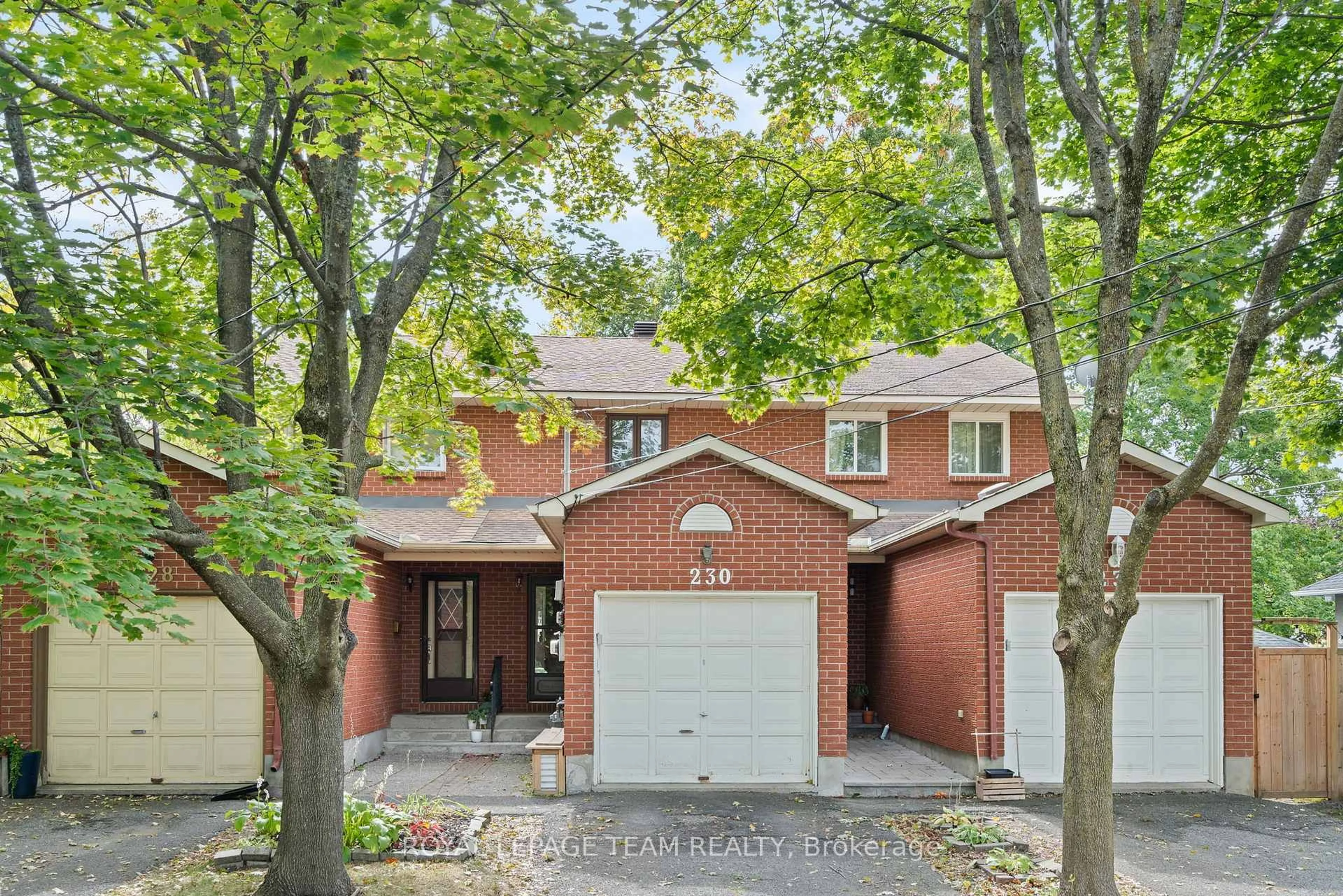 Home with brick exterior material, street for 230 Currell Ave, Ottawa Ontario K1Z 7J3