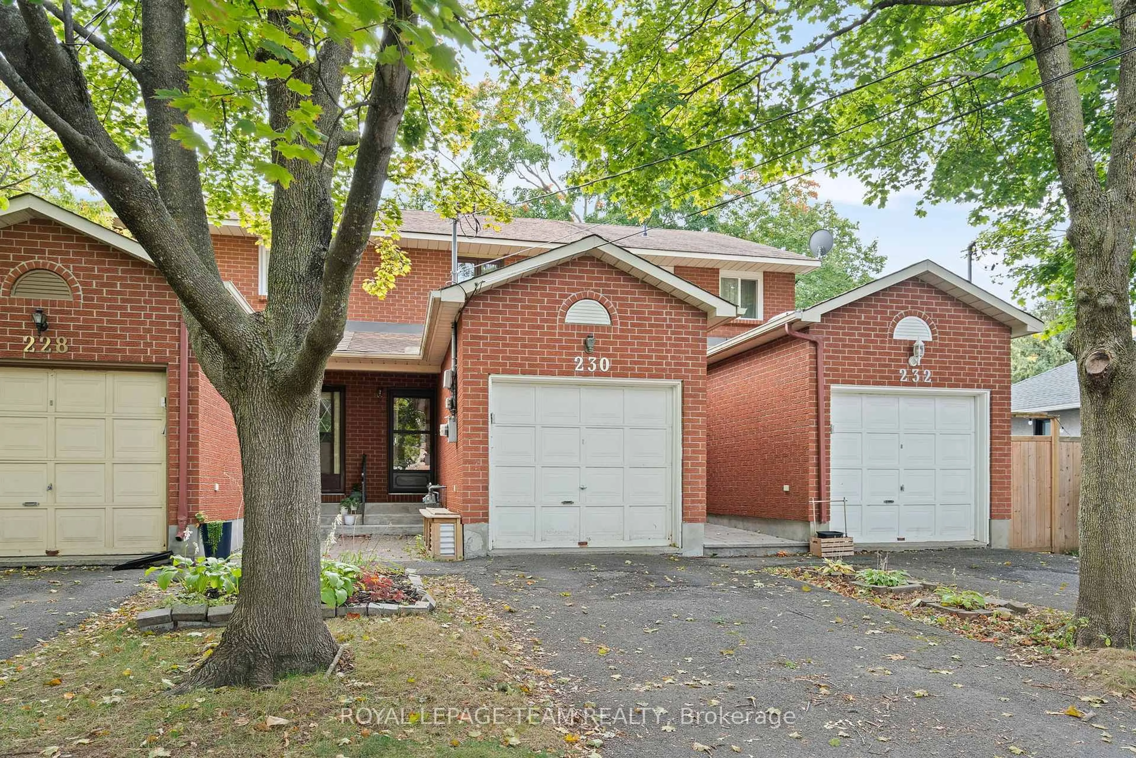 Home with brick exterior material, street for 230 Currell Ave, Ottawa Ontario K1Z 7J3